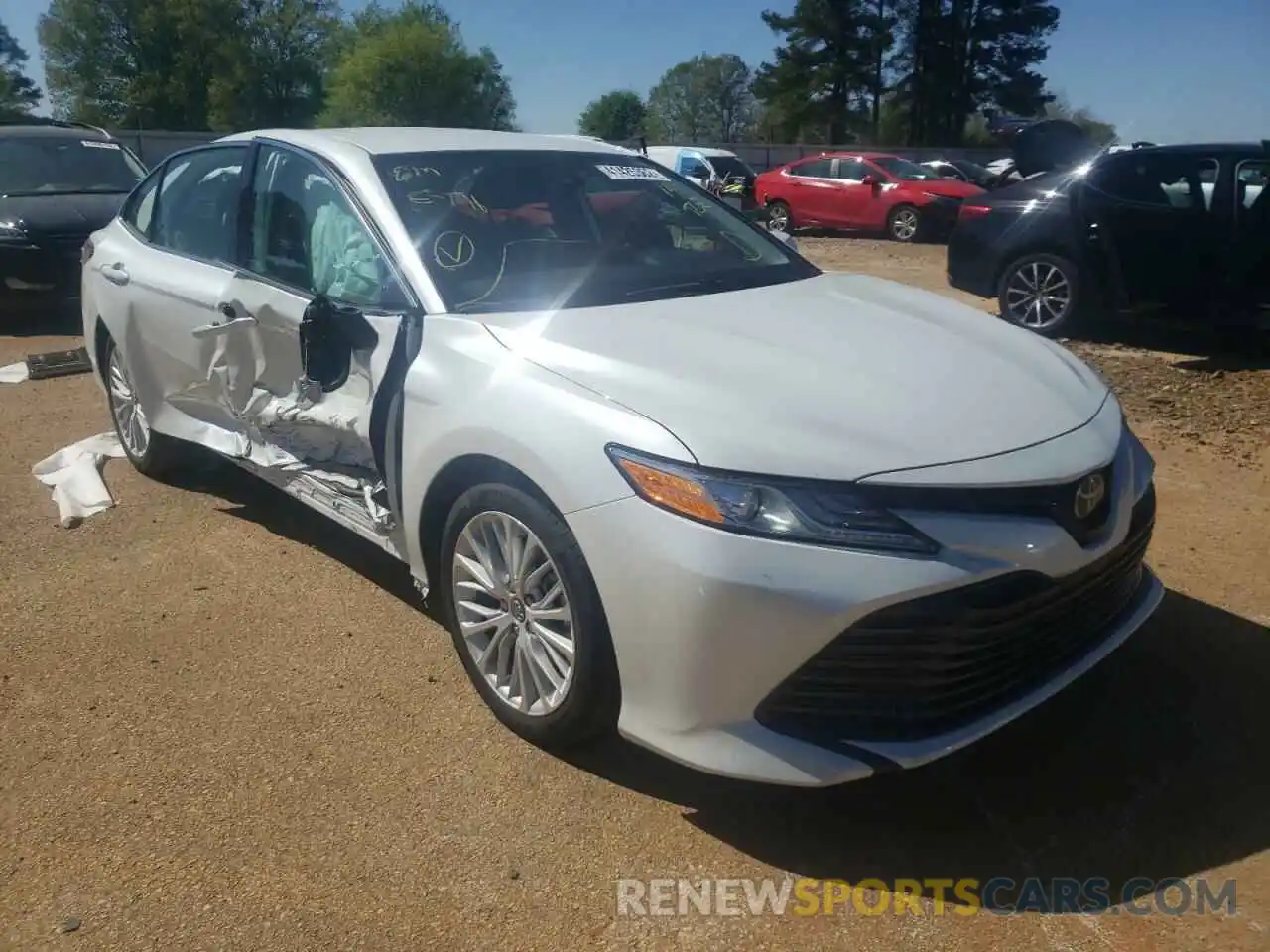 1 Photograph of a damaged car 4T1B11HK5KU791411 TOYOTA CAMRY 2019