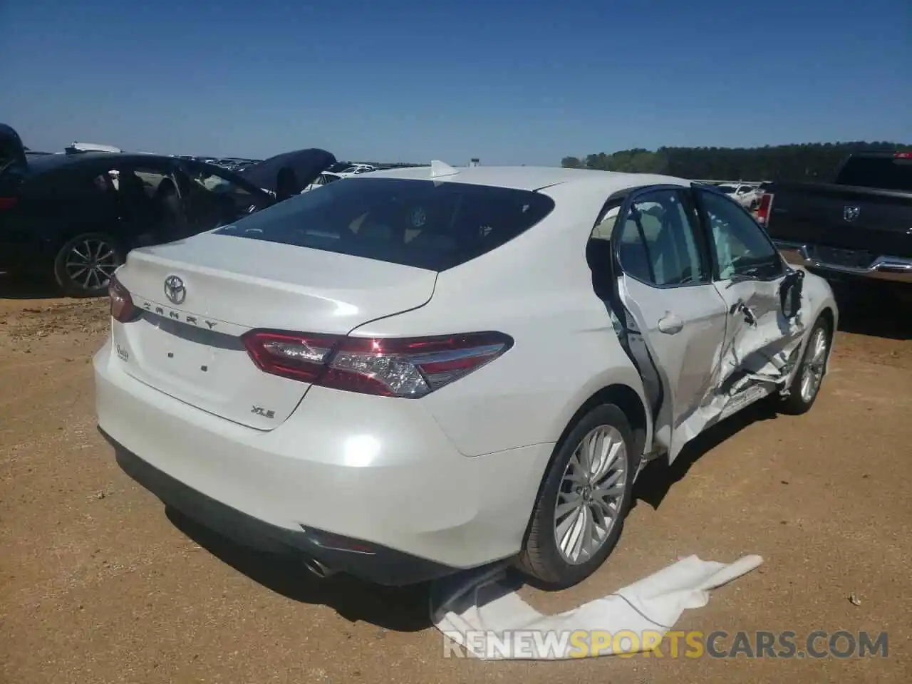 4 Photograph of a damaged car 4T1B11HK5KU791411 TOYOTA CAMRY 2019