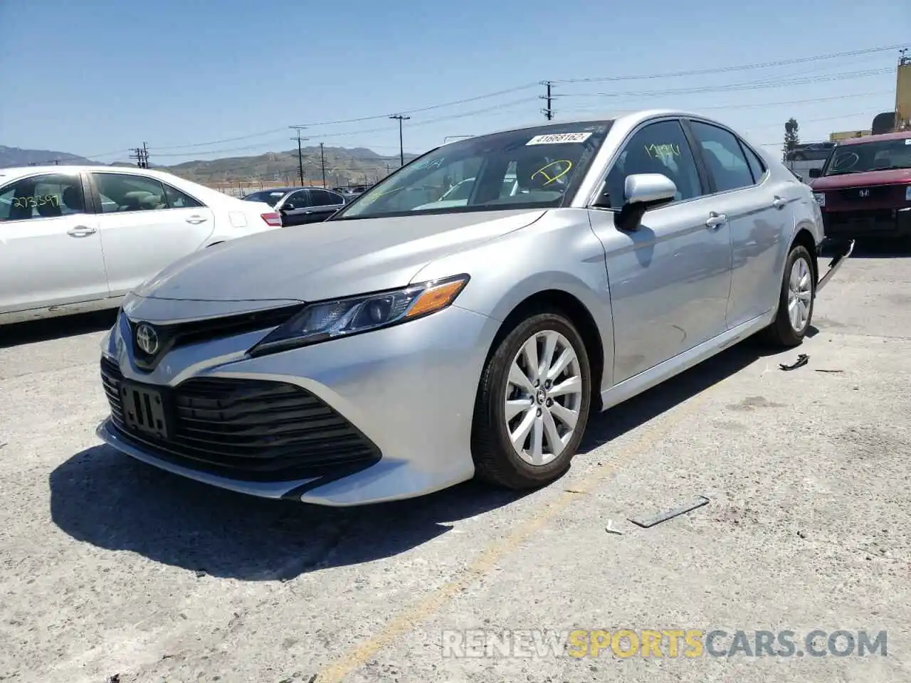 2 Photograph of a damaged car 4T1B11HK5KU794440 TOYOTA CAMRY 2019