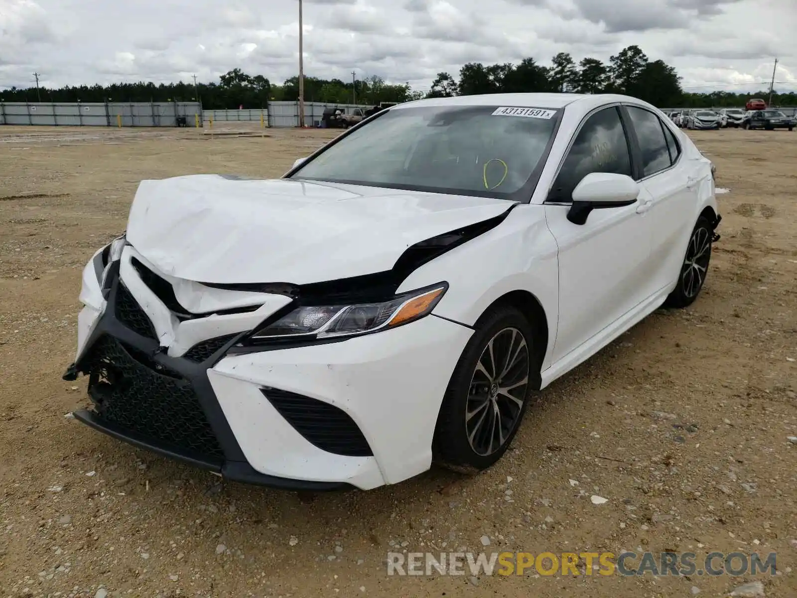 2 Photograph of a damaged car 4T1B11HK5KU794793 TOYOTA CAMRY 2019