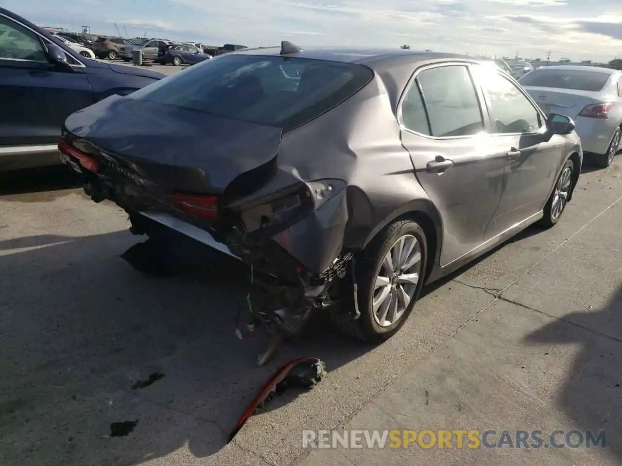 4 Photograph of a damaged car 4T1B11HK5KU797158 TOYOTA CAMRY 2019