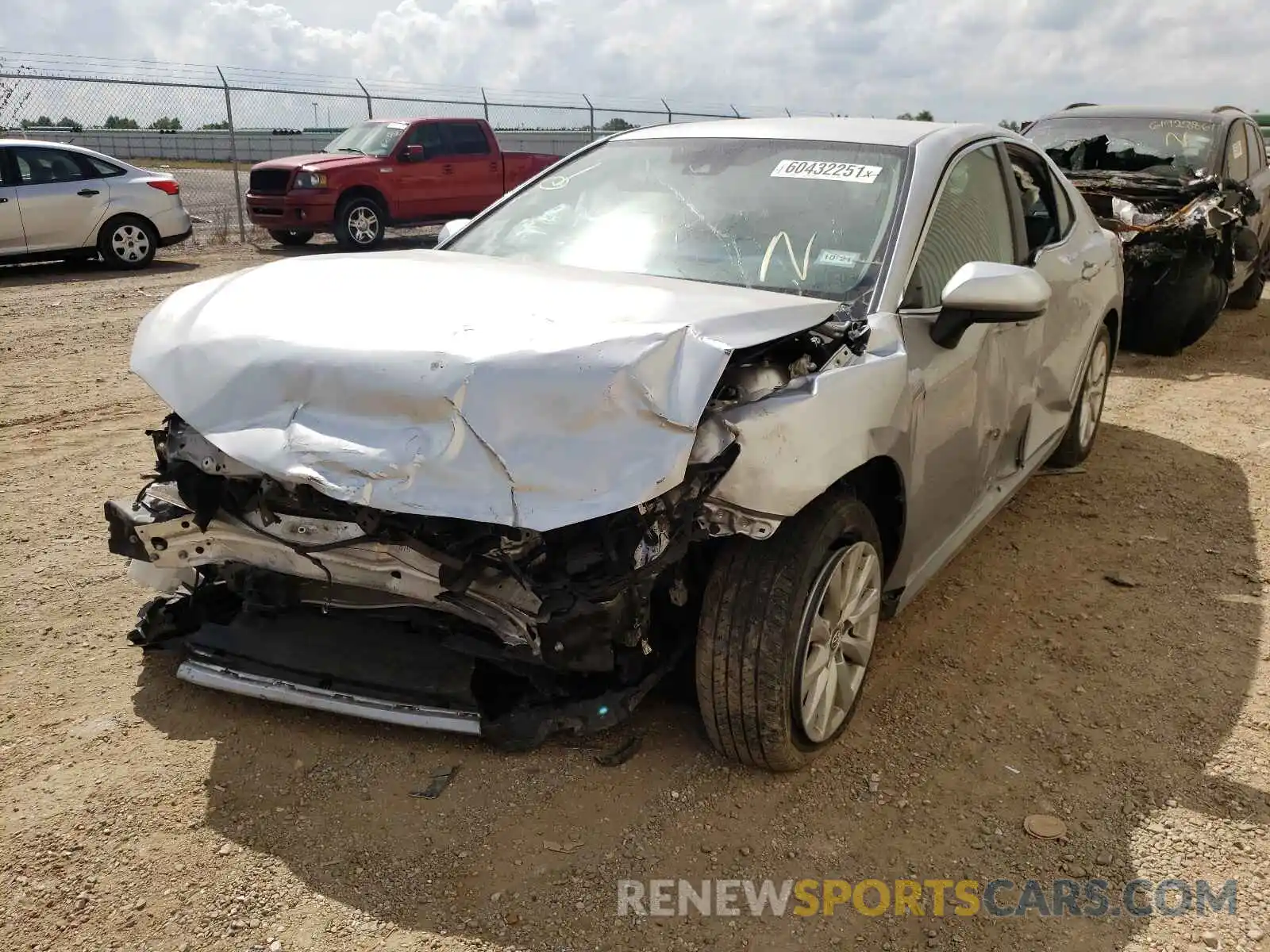 2 Photograph of a damaged car 4T1B11HK5KU799881 TOYOTA CAMRY 2019