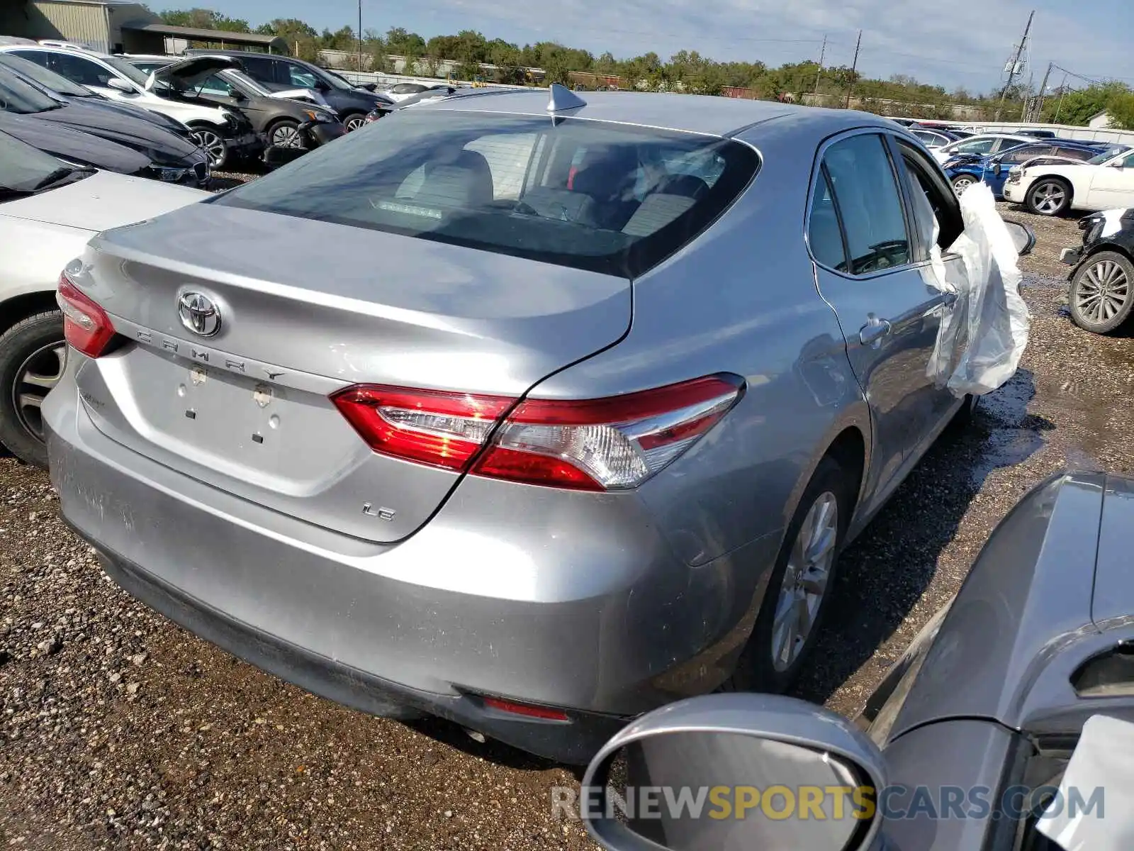 4 Photograph of a damaged car 4T1B11HK5KU799881 TOYOTA CAMRY 2019