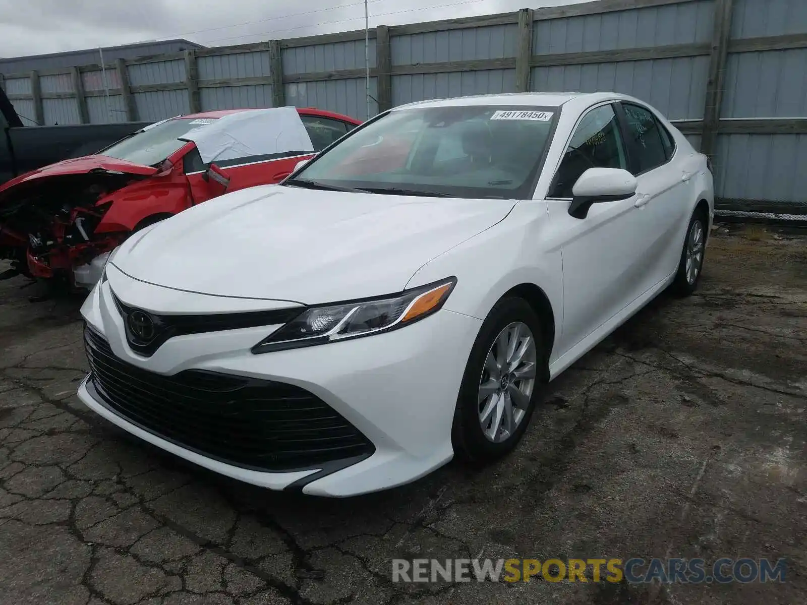 2 Photograph of a damaged car 4T1B11HK5KU800284 TOYOTA CAMRY 2019