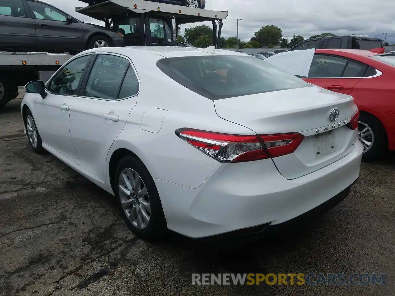 3 Photograph of a damaged car 4T1B11HK5KU800284 TOYOTA CAMRY 2019