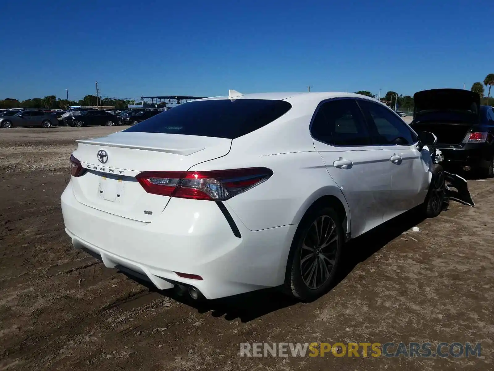 4 Photograph of a damaged car 4T1B11HK5KU800401 TOYOTA CAMRY 2019