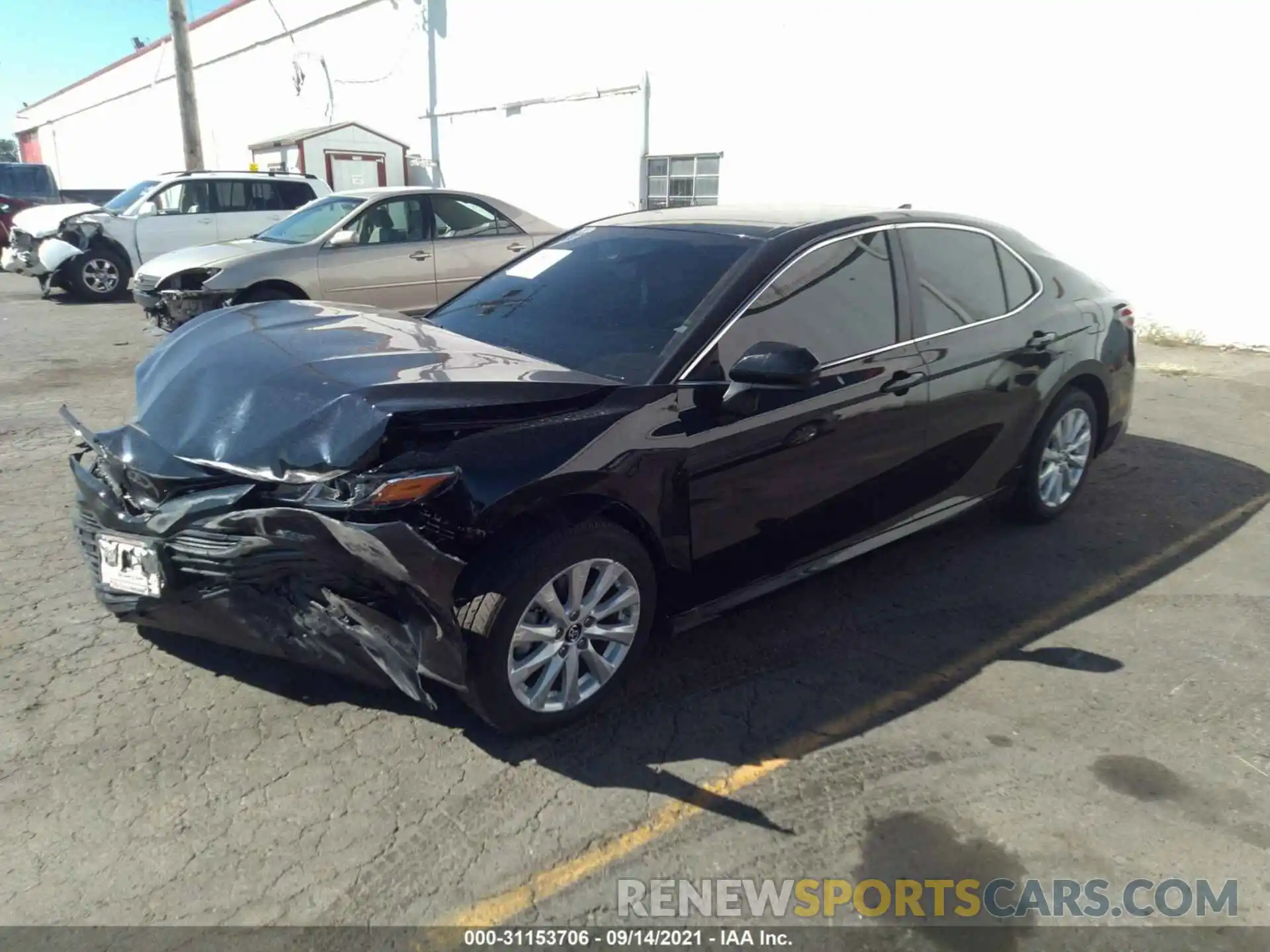 2 Photograph of a damaged car 4T1B11HK5KU801273 TOYOTA CAMRY 2019