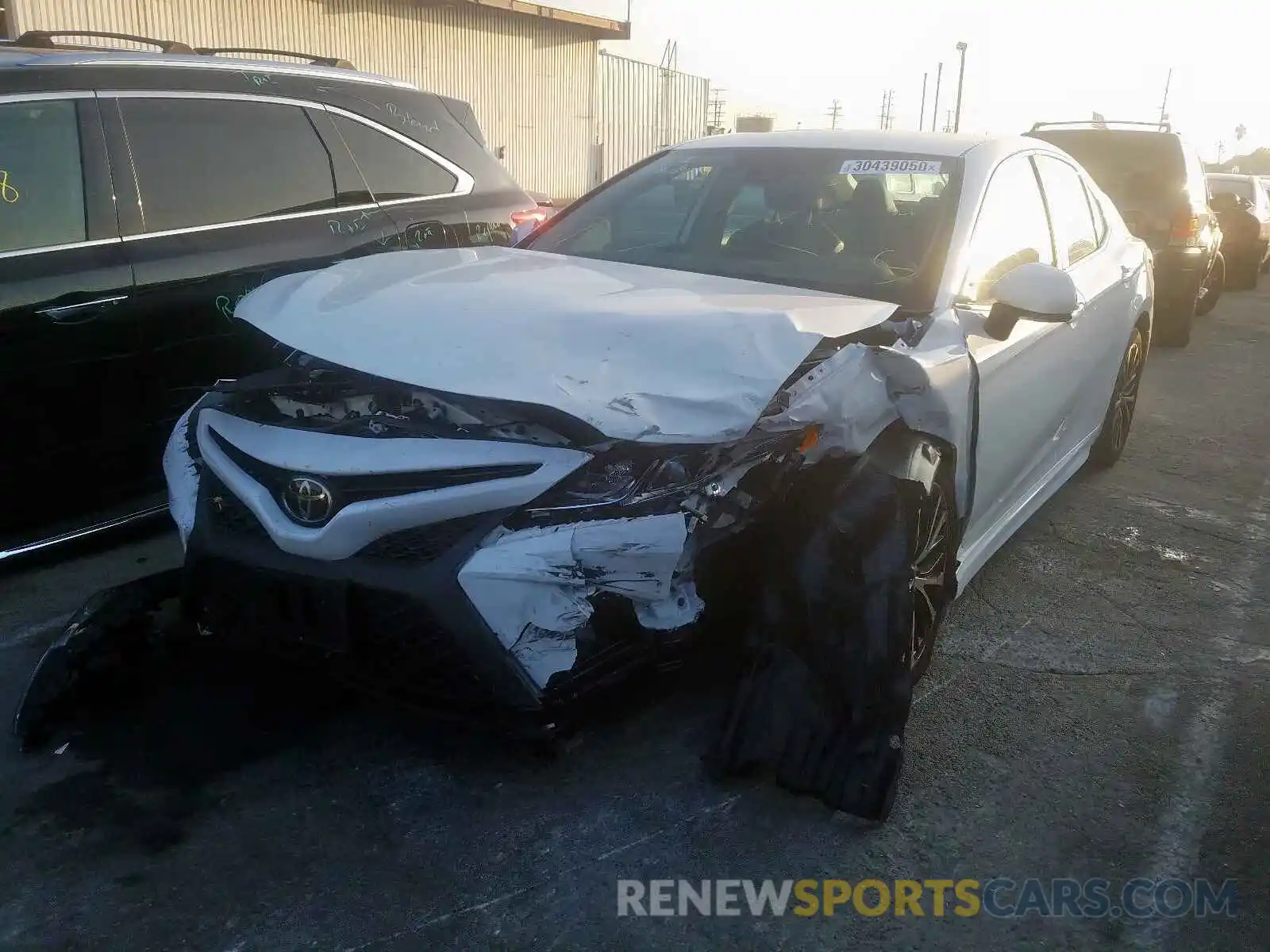 2 Photograph of a damaged car 4T1B11HK5KU801872 TOYOTA CAMRY 2019