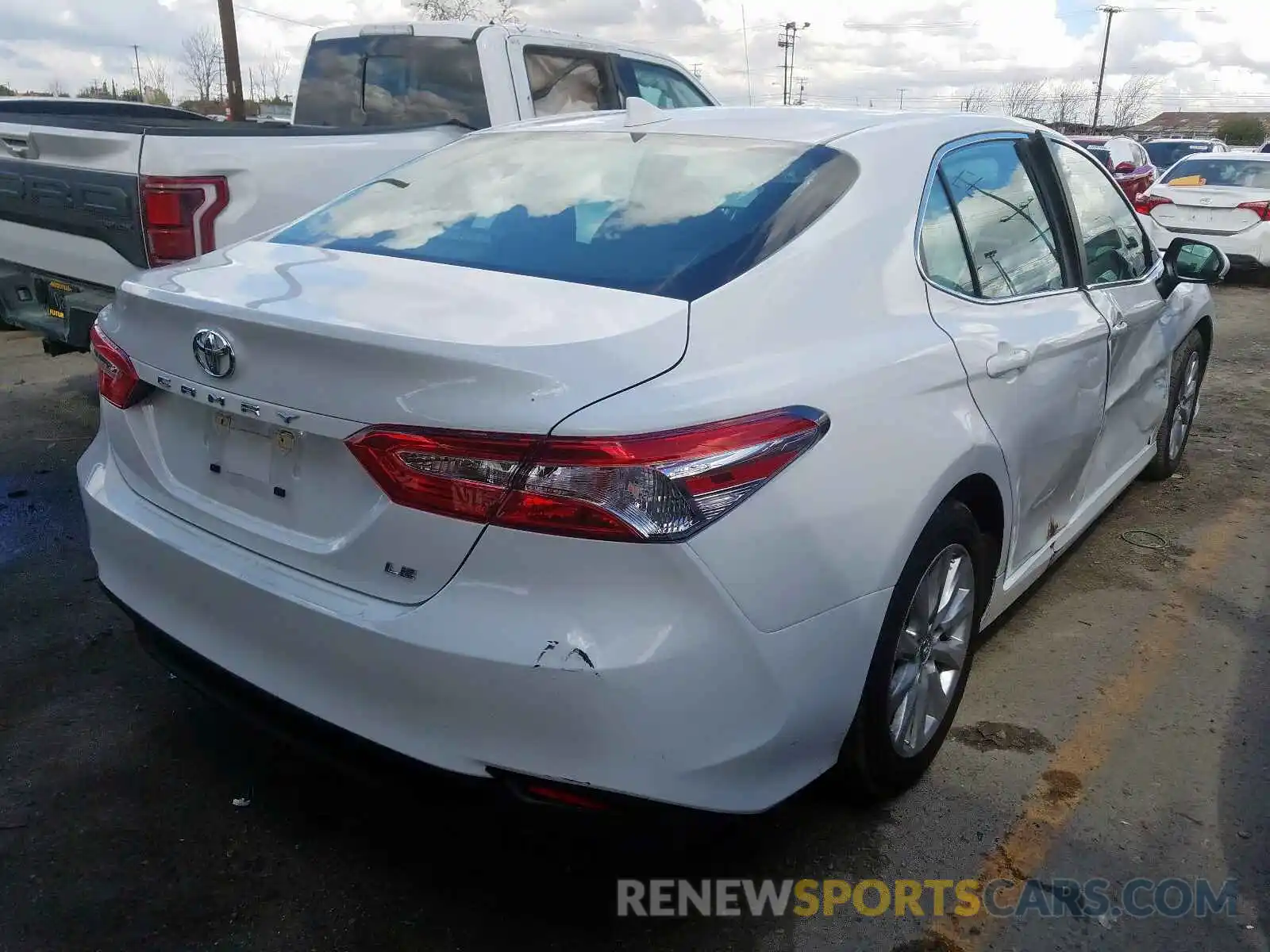 4 Photograph of a damaged car 4T1B11HK5KU802956 TOYOTA CAMRY 2019