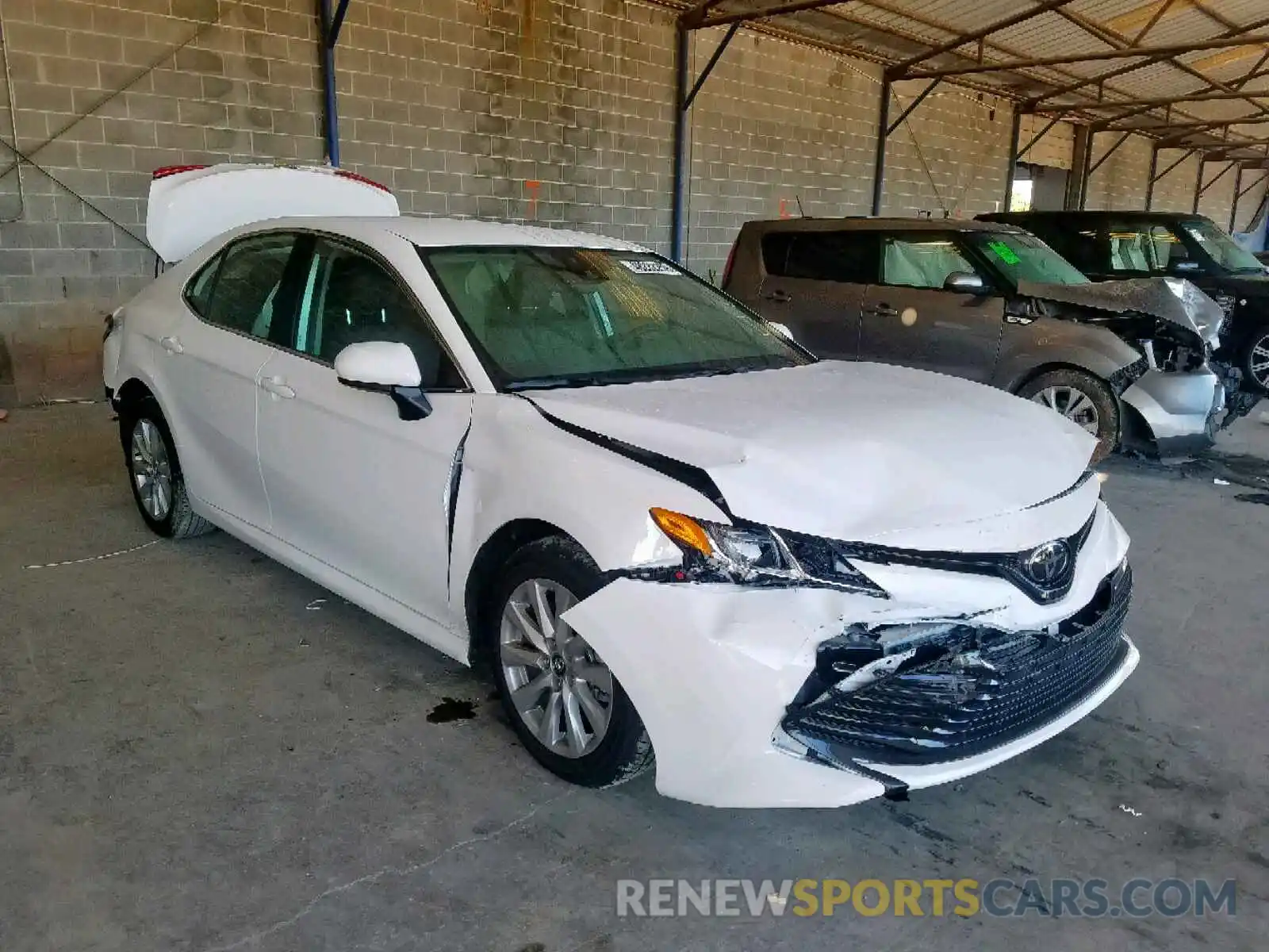 1 Photograph of a damaged car 4T1B11HK5KU802990 TOYOTA CAMRY 2019