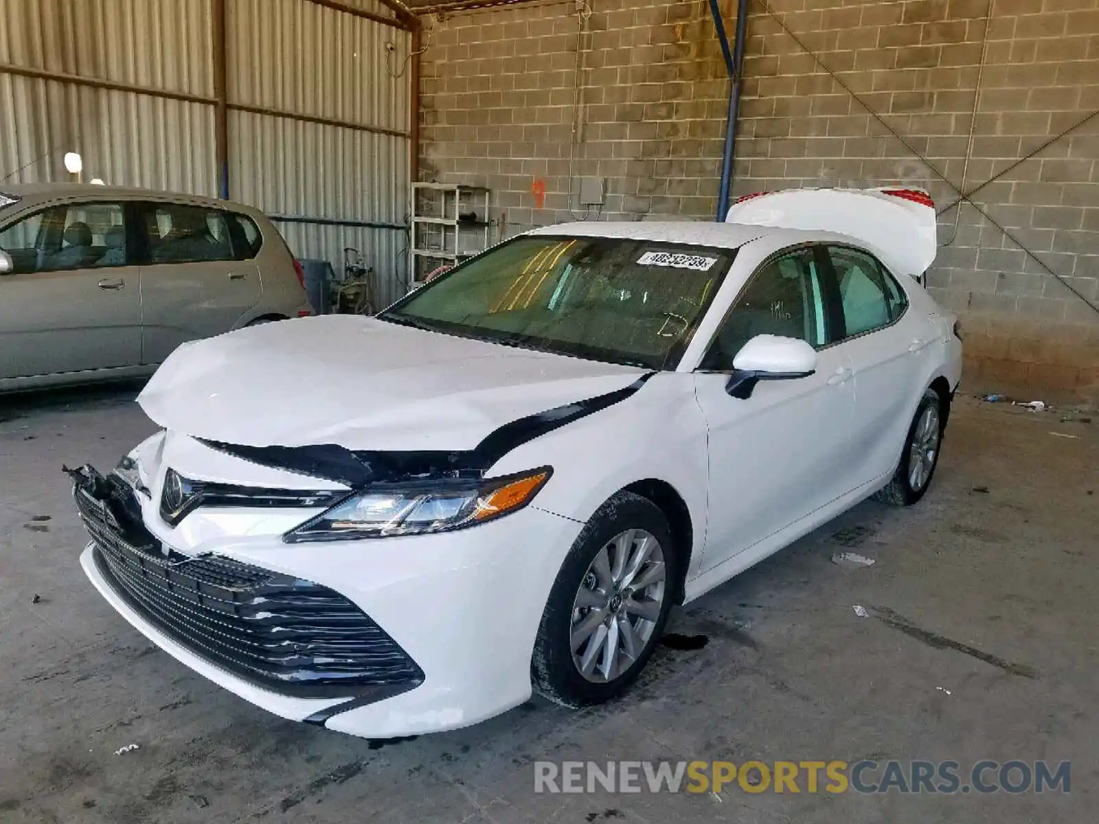 2 Photograph of a damaged car 4T1B11HK5KU802990 TOYOTA CAMRY 2019