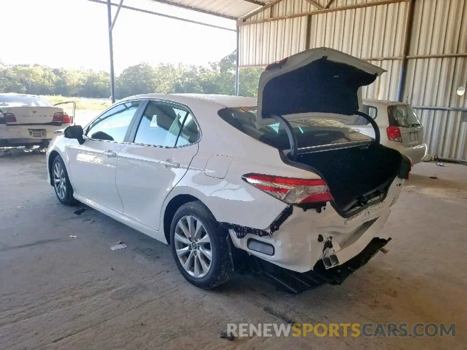 3 Photograph of a damaged car 4T1B11HK5KU802990 TOYOTA CAMRY 2019