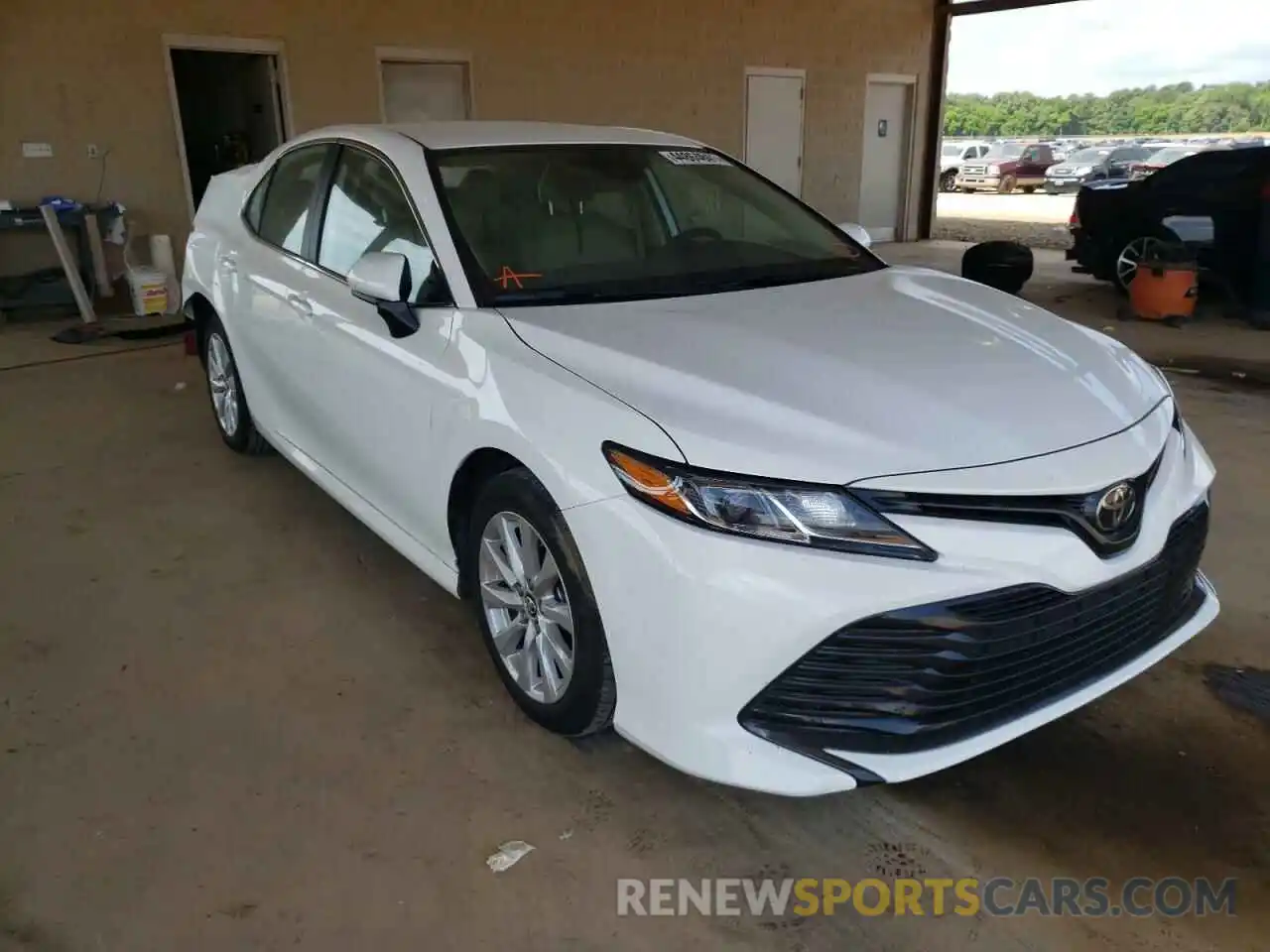 1 Photograph of a damaged car 4T1B11HK5KU803069 TOYOTA CAMRY 2019