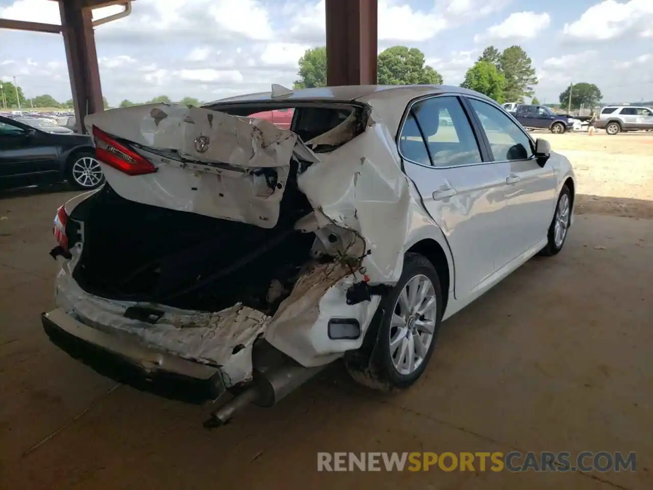 4 Photograph of a damaged car 4T1B11HK5KU803069 TOYOTA CAMRY 2019