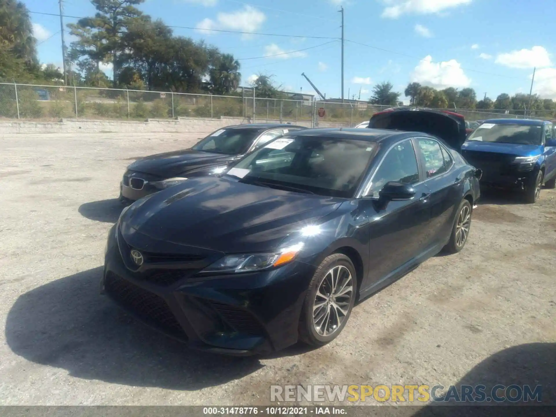 2 Photograph of a damaged car 4T1B11HK5KU803380 TOYOTA CAMRY 2019