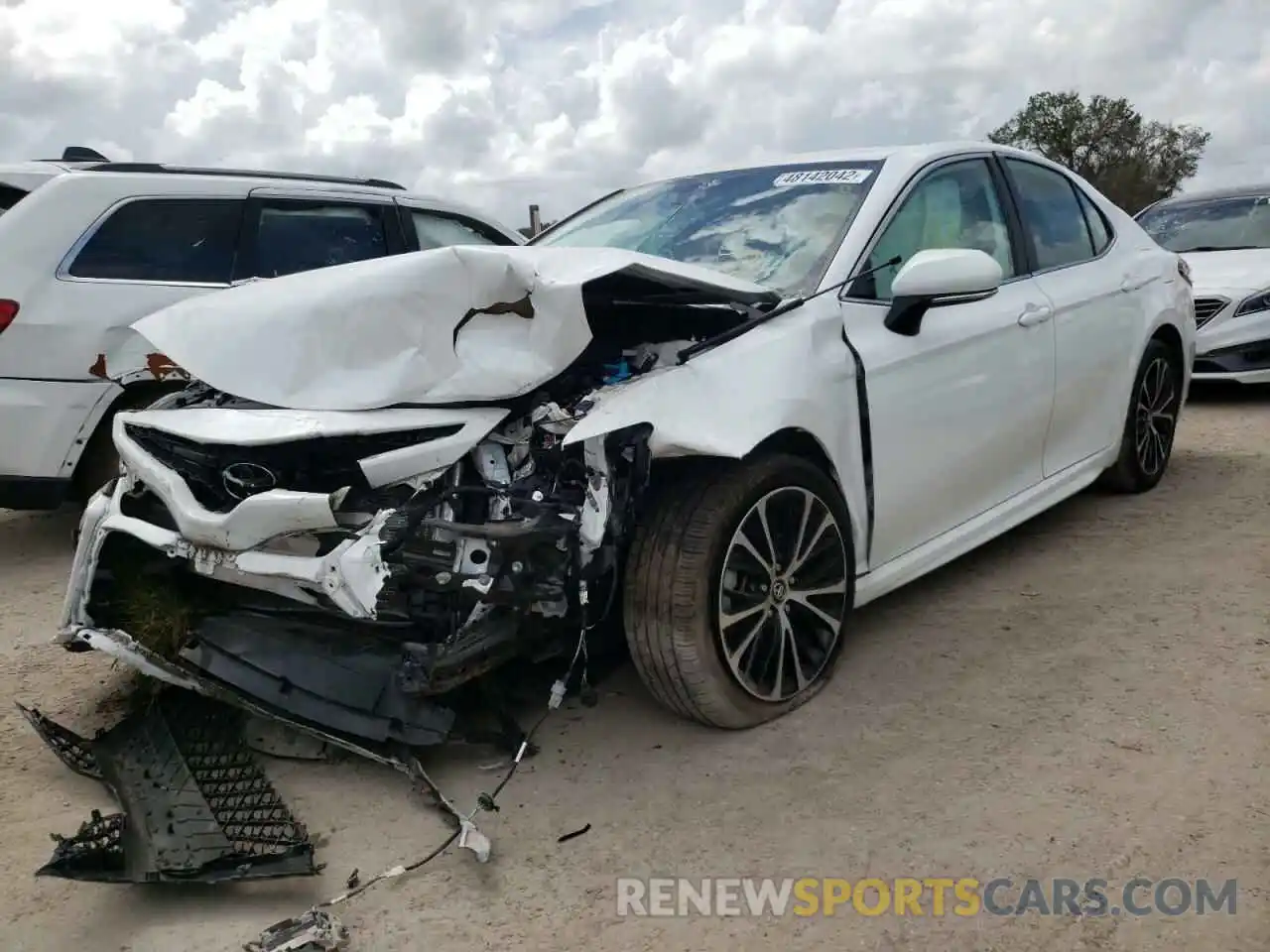 2 Photograph of a damaged car 4T1B11HK5KU809308 TOYOTA CAMRY 2019