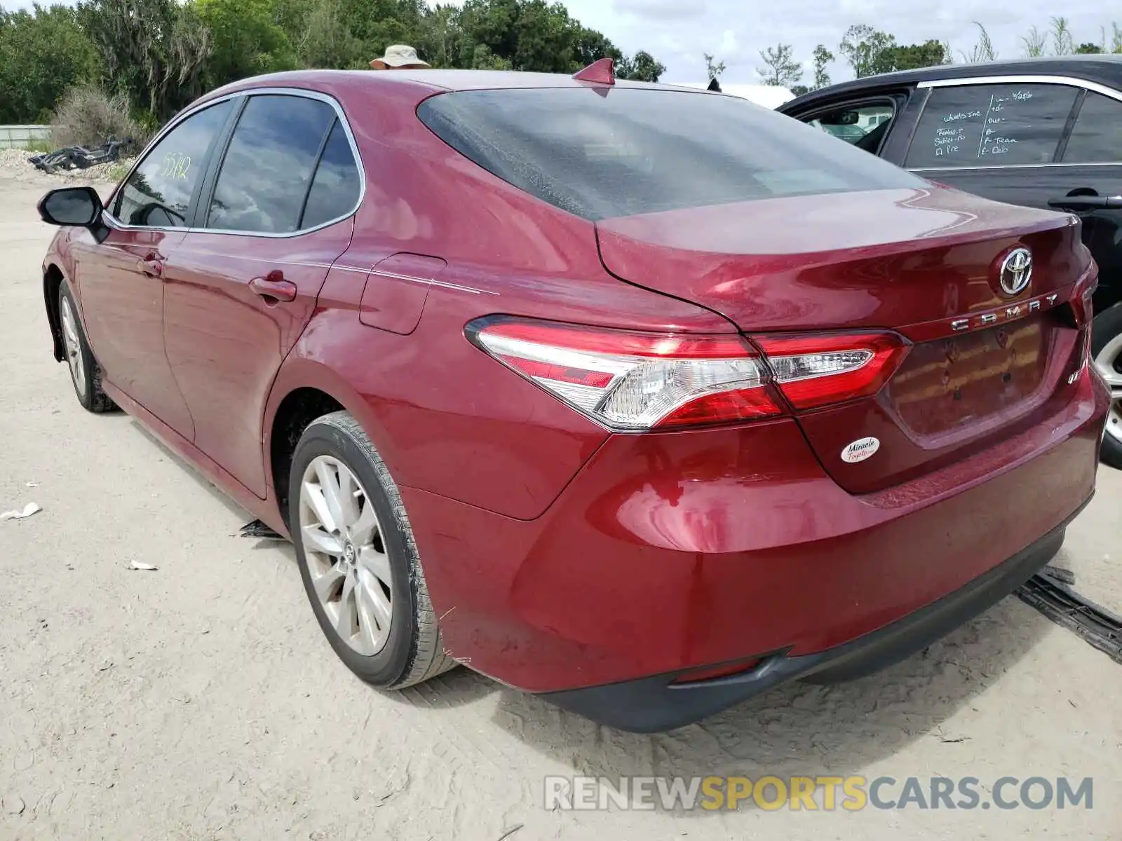 3 Photograph of a damaged car 4T1B11HK5KU809695 TOYOTA CAMRY 2019