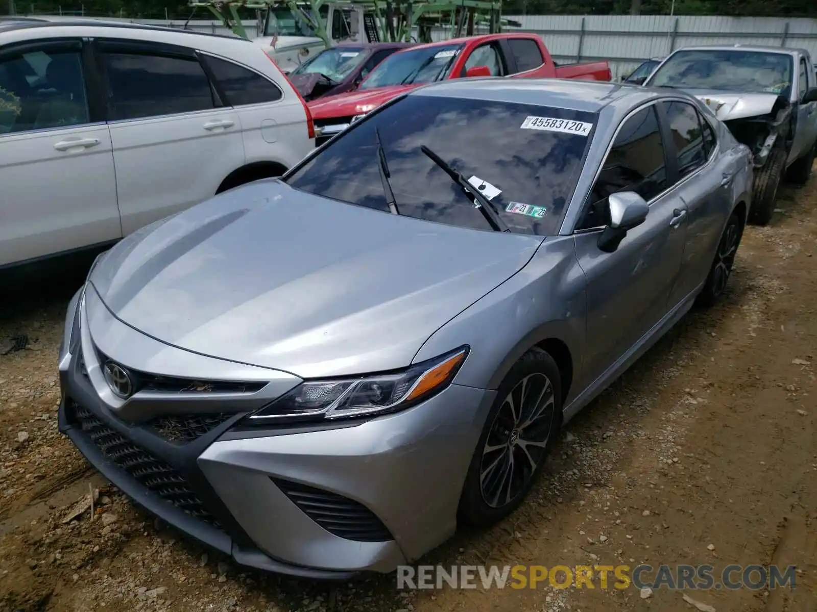 2 Photograph of a damaged car 4T1B11HK5KU809924 TOYOTA CAMRY 2019