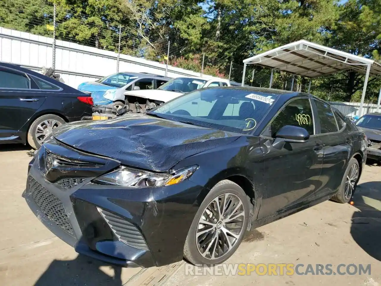 2 Photograph of a damaged car 4T1B11HK5KU813469 TOYOTA CAMRY 2019