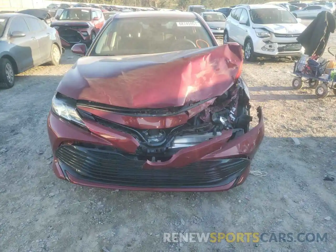 9 Photograph of a damaged car 4T1B11HK5KU813715 TOYOTA CAMRY 2019