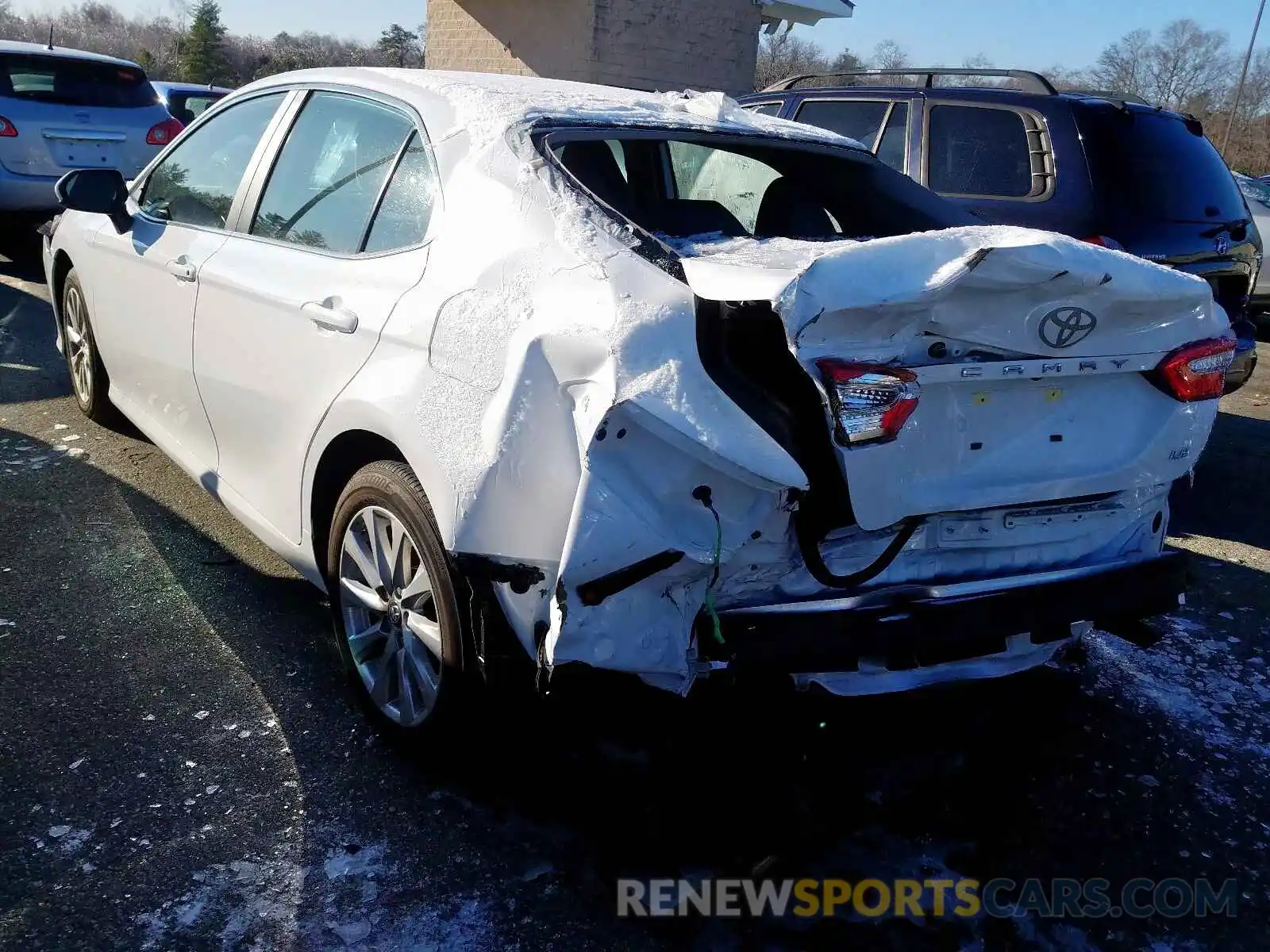 3 Photograph of a damaged car 4T1B11HK5KU814511 TOYOTA CAMRY 2019