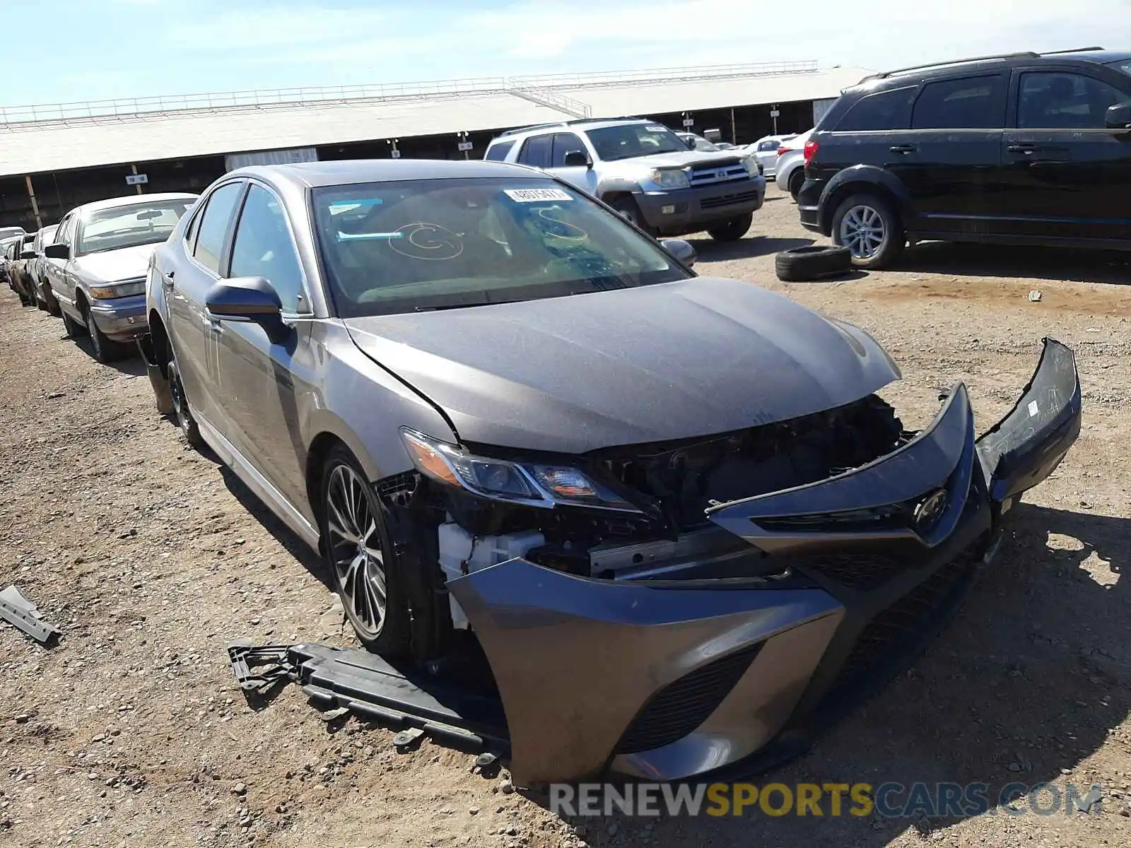 1 Photograph of a damaged car 4T1B11HK5KU814847 TOYOTA CAMRY 2019