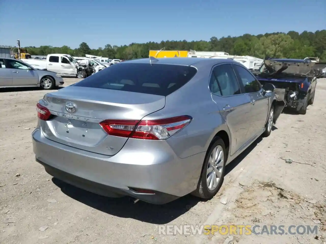 4 Photograph of a damaged car 4T1B11HK5KU817702 TOYOTA CAMRY 2019