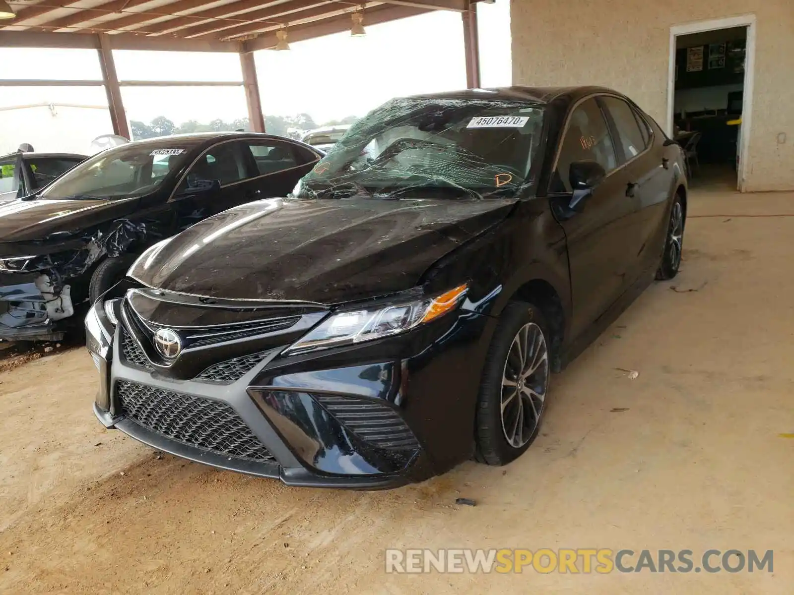 2 Photograph of a damaged car 4T1B11HK5KU819966 TOYOTA CAMRY 2019