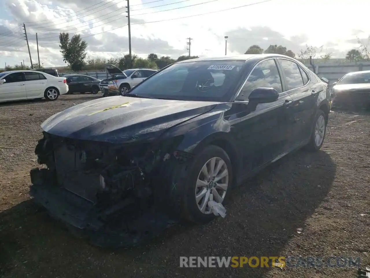 2 Photograph of a damaged car 4T1B11HK5KU826383 TOYOTA CAMRY 2019