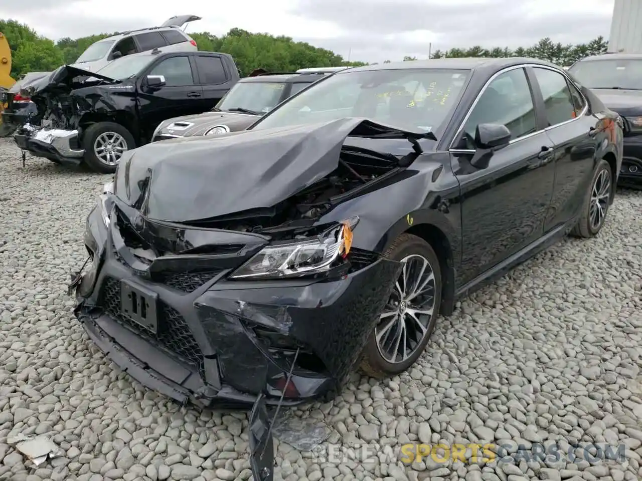 2 Photograph of a damaged car 4T1B11HK5KU828618 TOYOTA CAMRY 2019