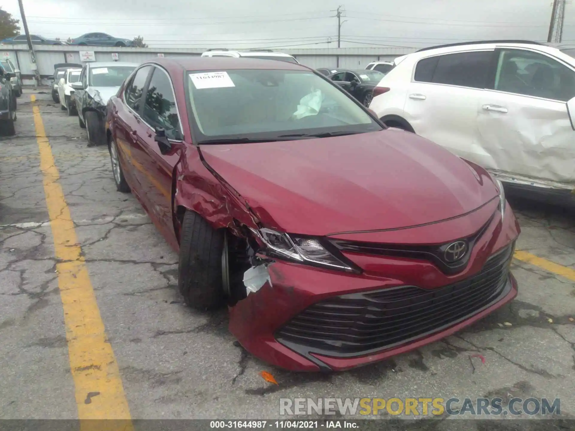 1 Photograph of a damaged car 4T1B11HK5KU829719 TOYOTA CAMRY 2019