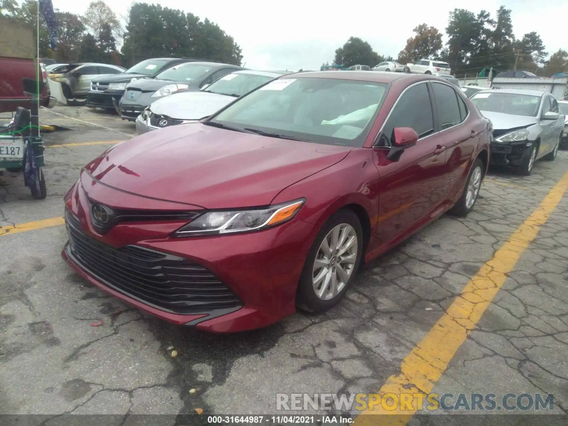 2 Photograph of a damaged car 4T1B11HK5KU829719 TOYOTA CAMRY 2019