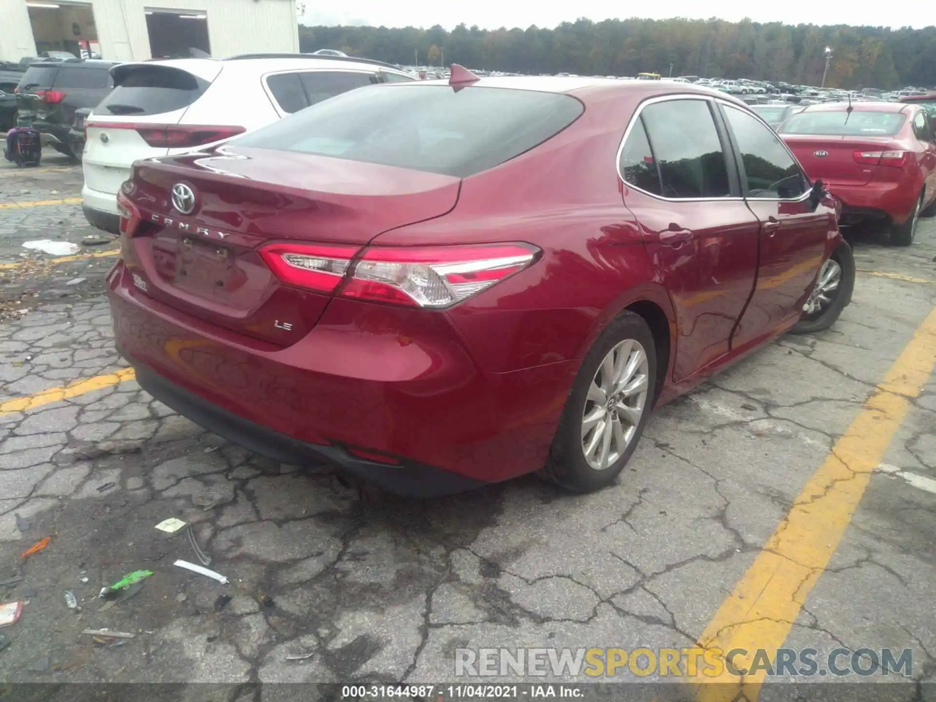 4 Photograph of a damaged car 4T1B11HK5KU829719 TOYOTA CAMRY 2019