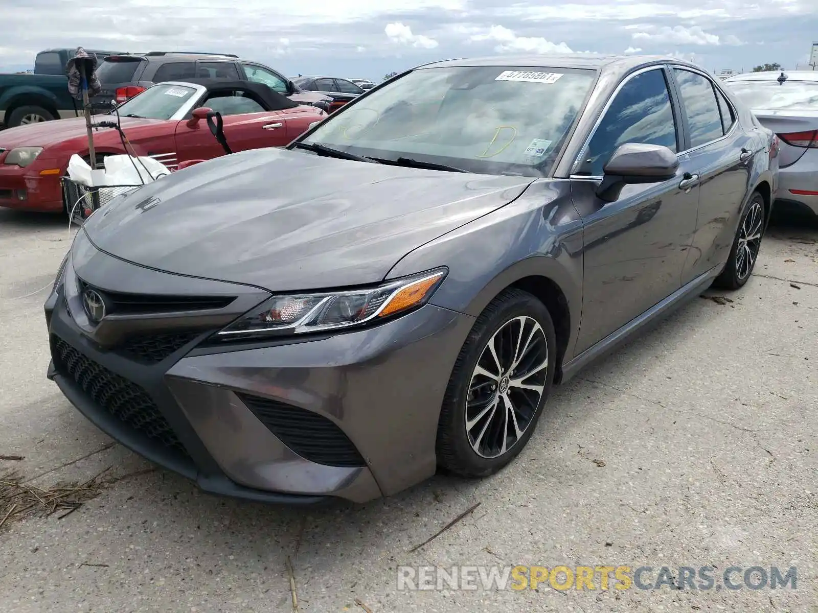 2 Photograph of a damaged car 4T1B11HK5KU831776 TOYOTA CAMRY 2019