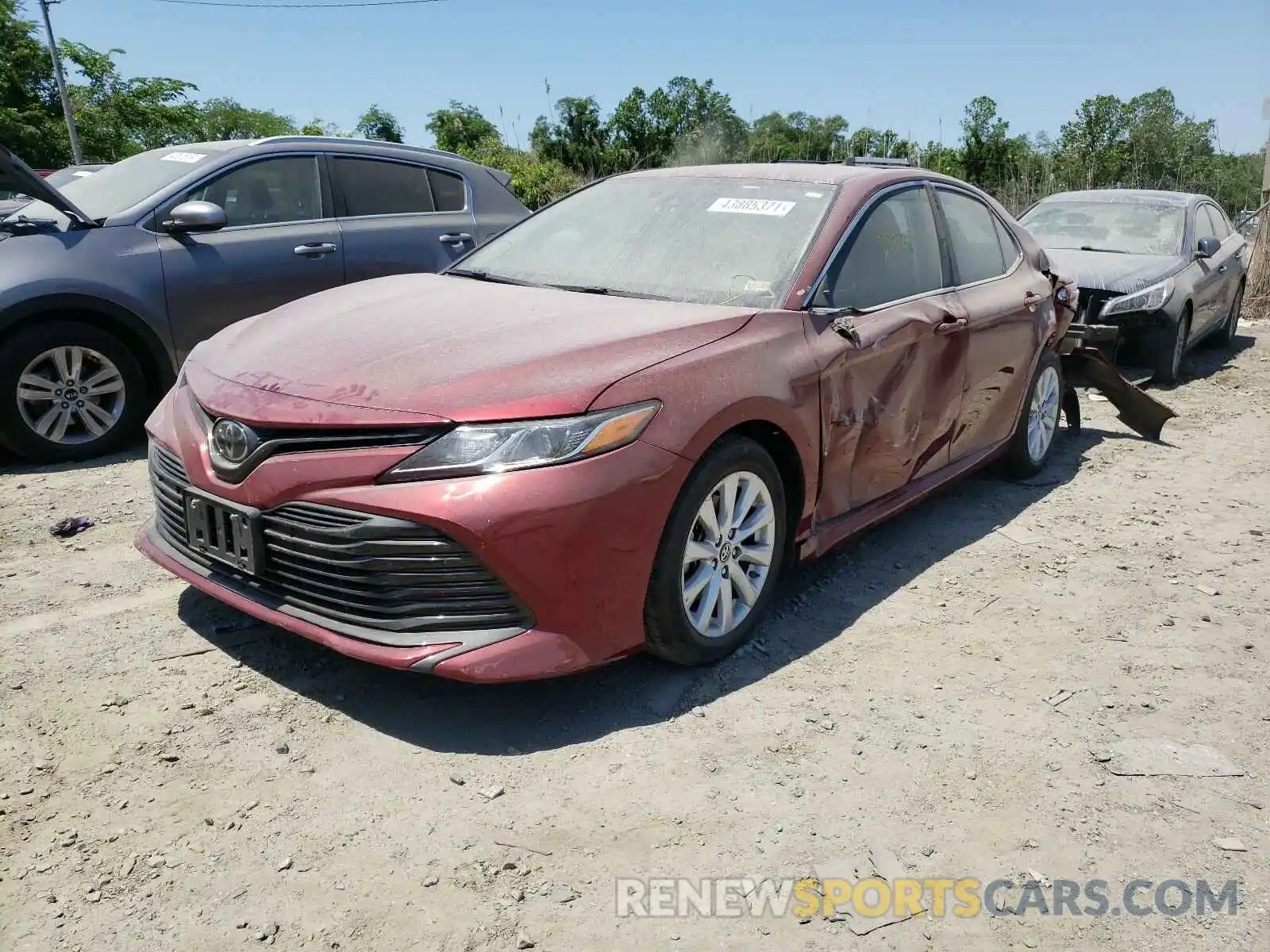 2 Photograph of a damaged car 4T1B11HK5KU834001 TOYOTA CAMRY 2019