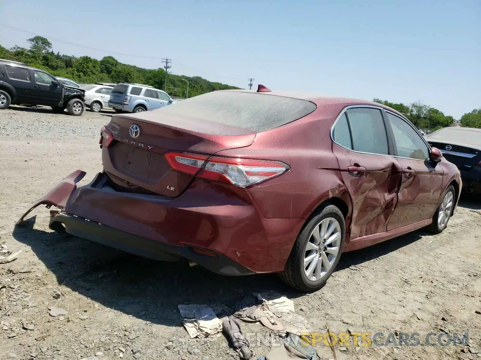 4 Photograph of a damaged car 4T1B11HK5KU834001 TOYOTA CAMRY 2019