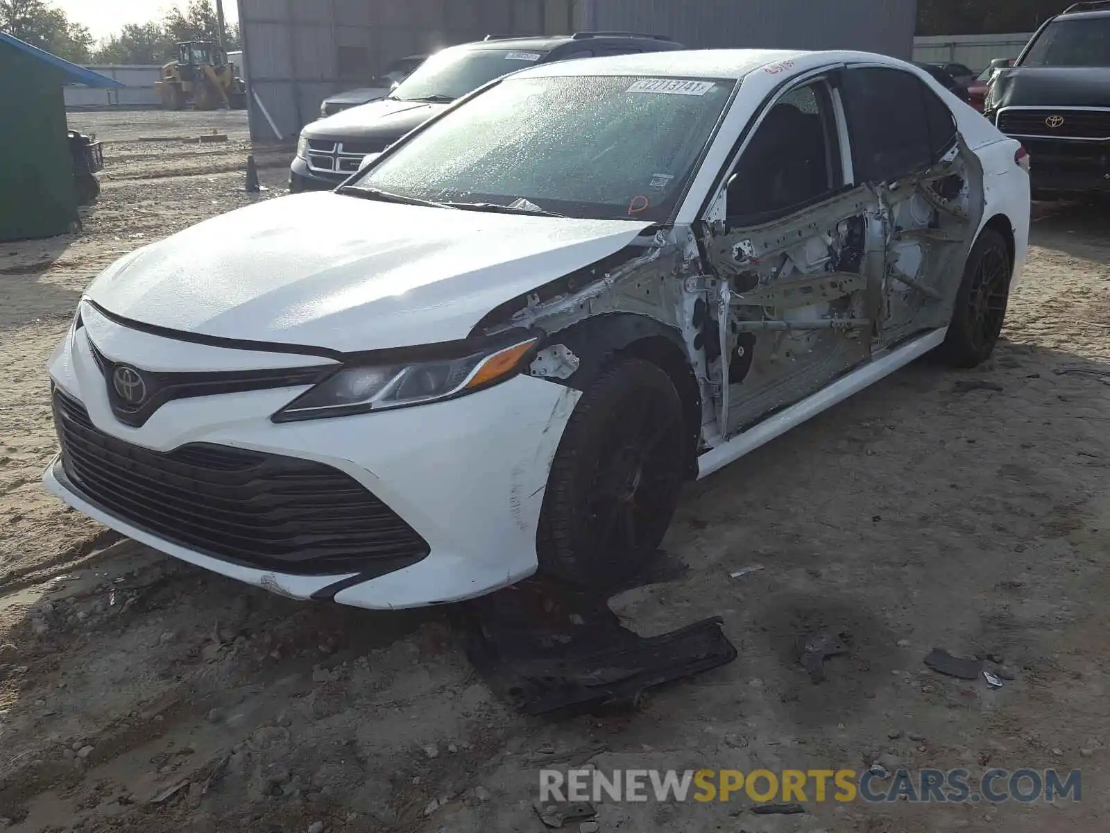 2 Photograph of a damaged car 4T1B11HK5KU835634 TOYOTA CAMRY 2019