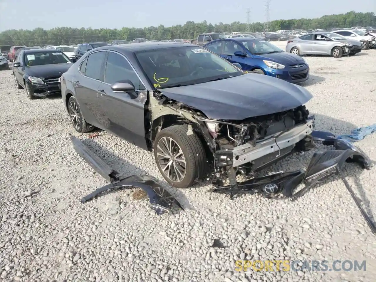 1 Photograph of a damaged car 4T1B11HK5KU837609 TOYOTA CAMRY 2019