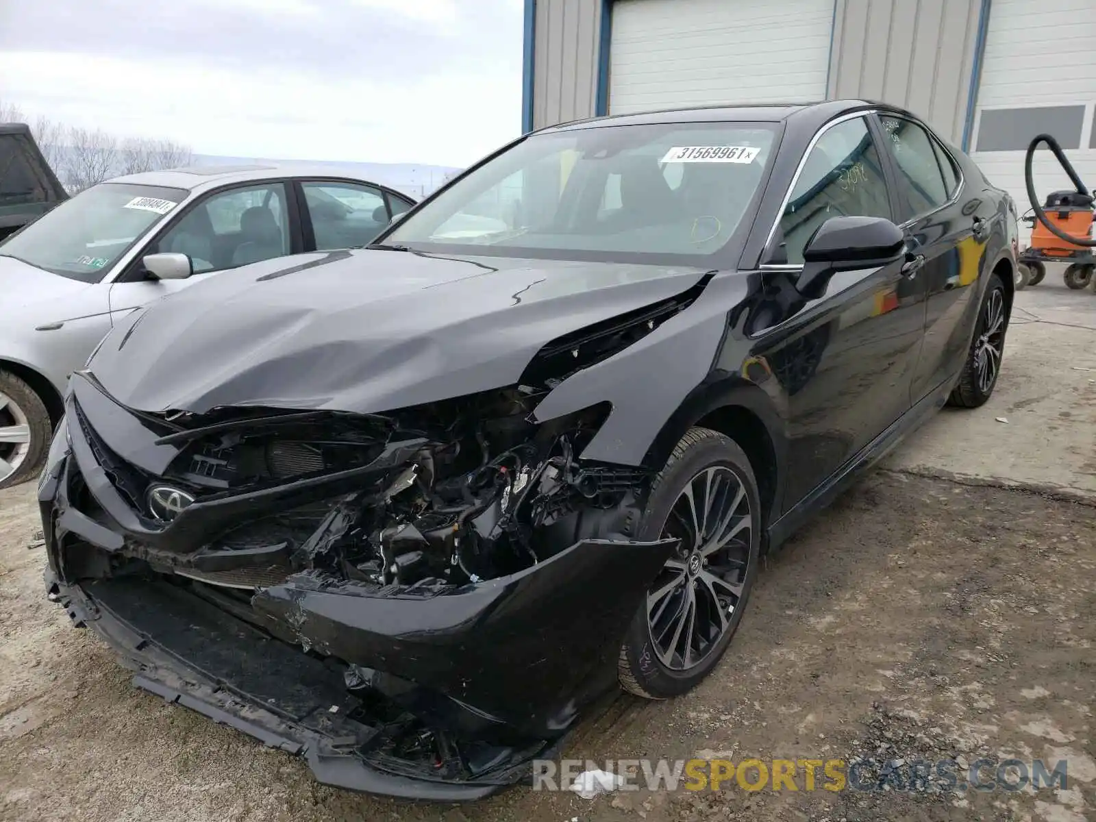 2 Photograph of a damaged car 4T1B11HK5KU839506 TOYOTA CAMRY 2019