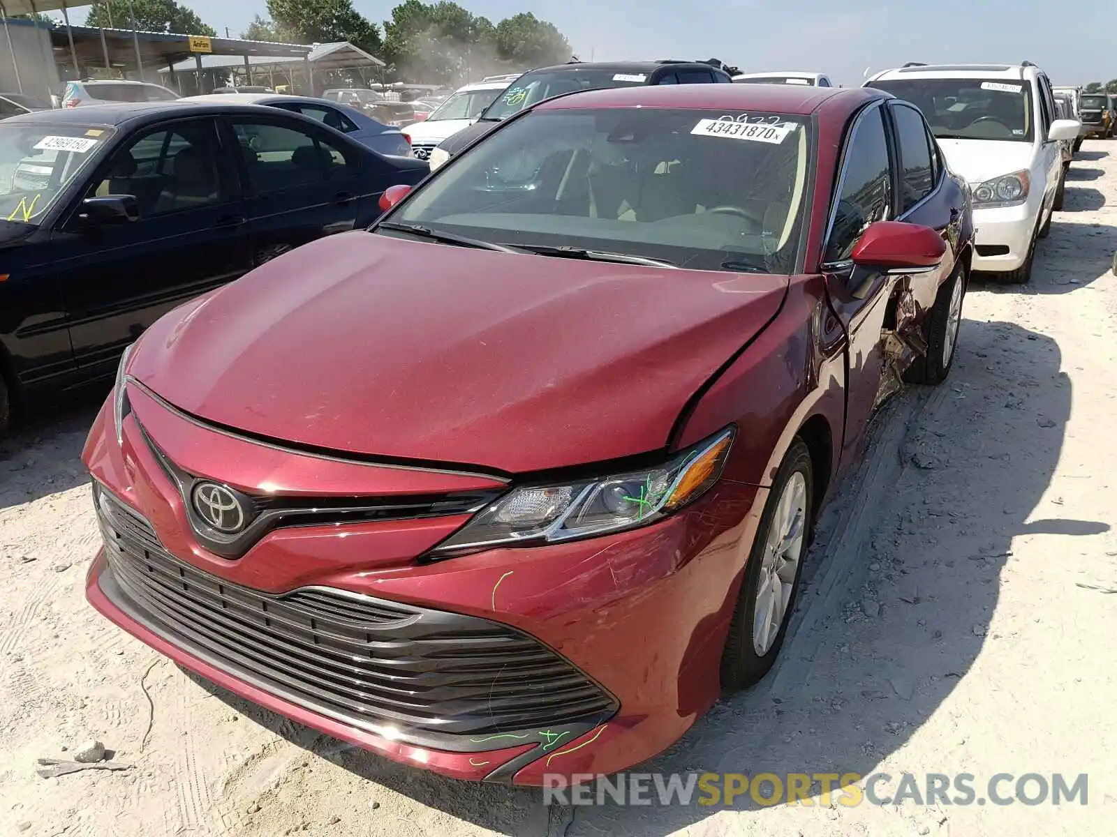 2 Photograph of a damaged car 4T1B11HK5KU840932 TOYOTA CAMRY 2019