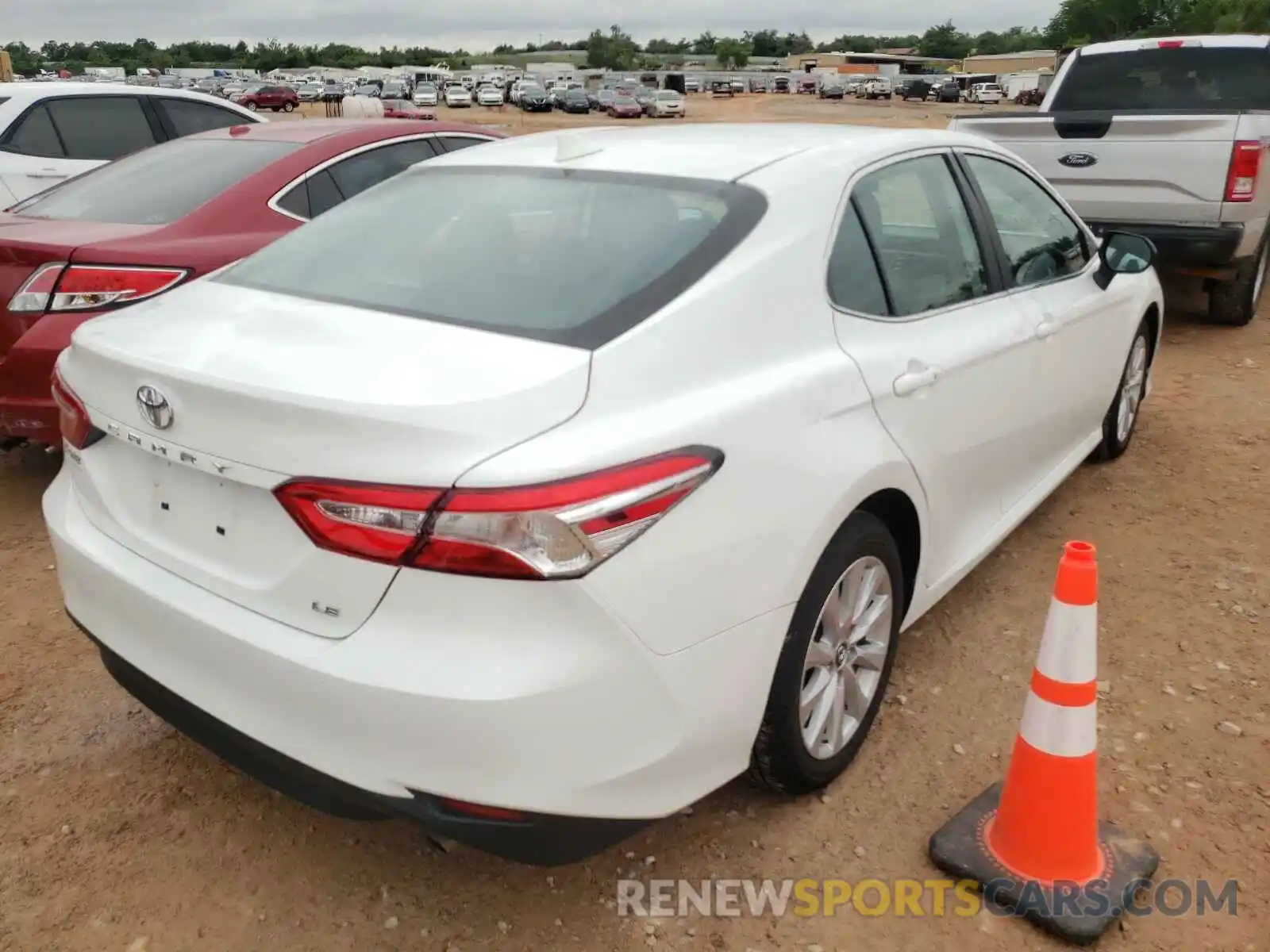 4 Photograph of a damaged car 4T1B11HK5KU843197 TOYOTA CAMRY 2019