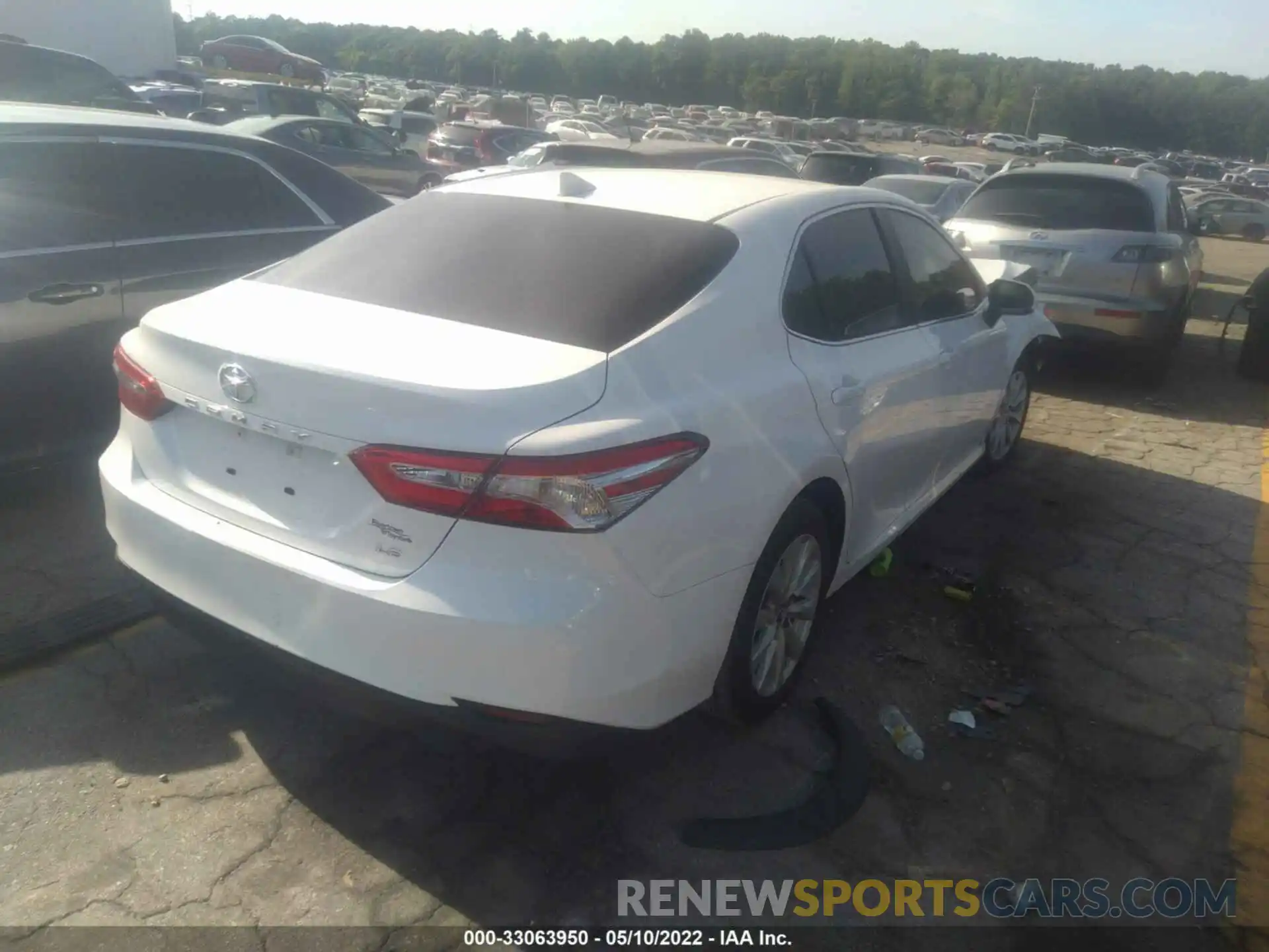 4 Photograph of a damaged car 4T1B11HK5KU843779 TOYOTA CAMRY 2019