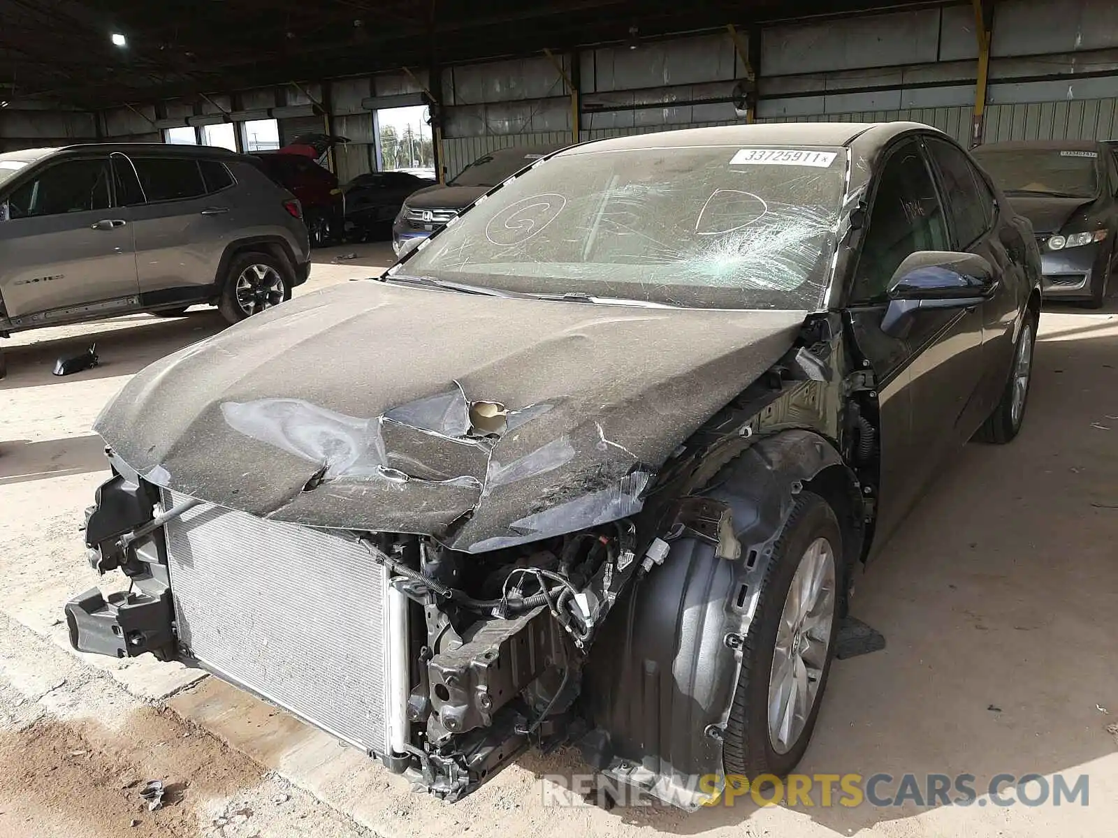 2 Photograph of a damaged car 4T1B11HK5KU847931 TOYOTA CAMRY 2019