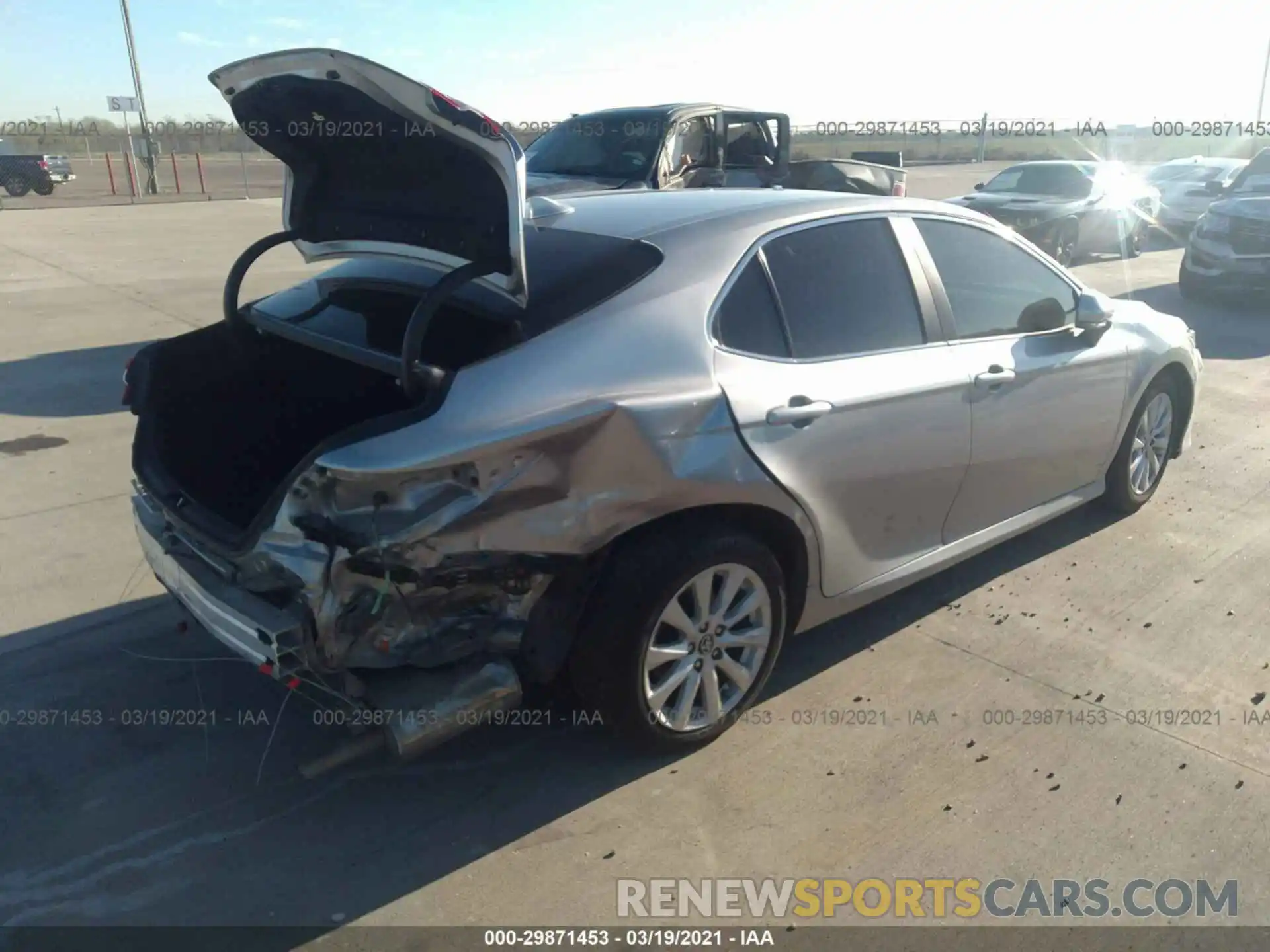 4 Photograph of a damaged car 4T1B11HK5KU850957 TOYOTA CAMRY 2019