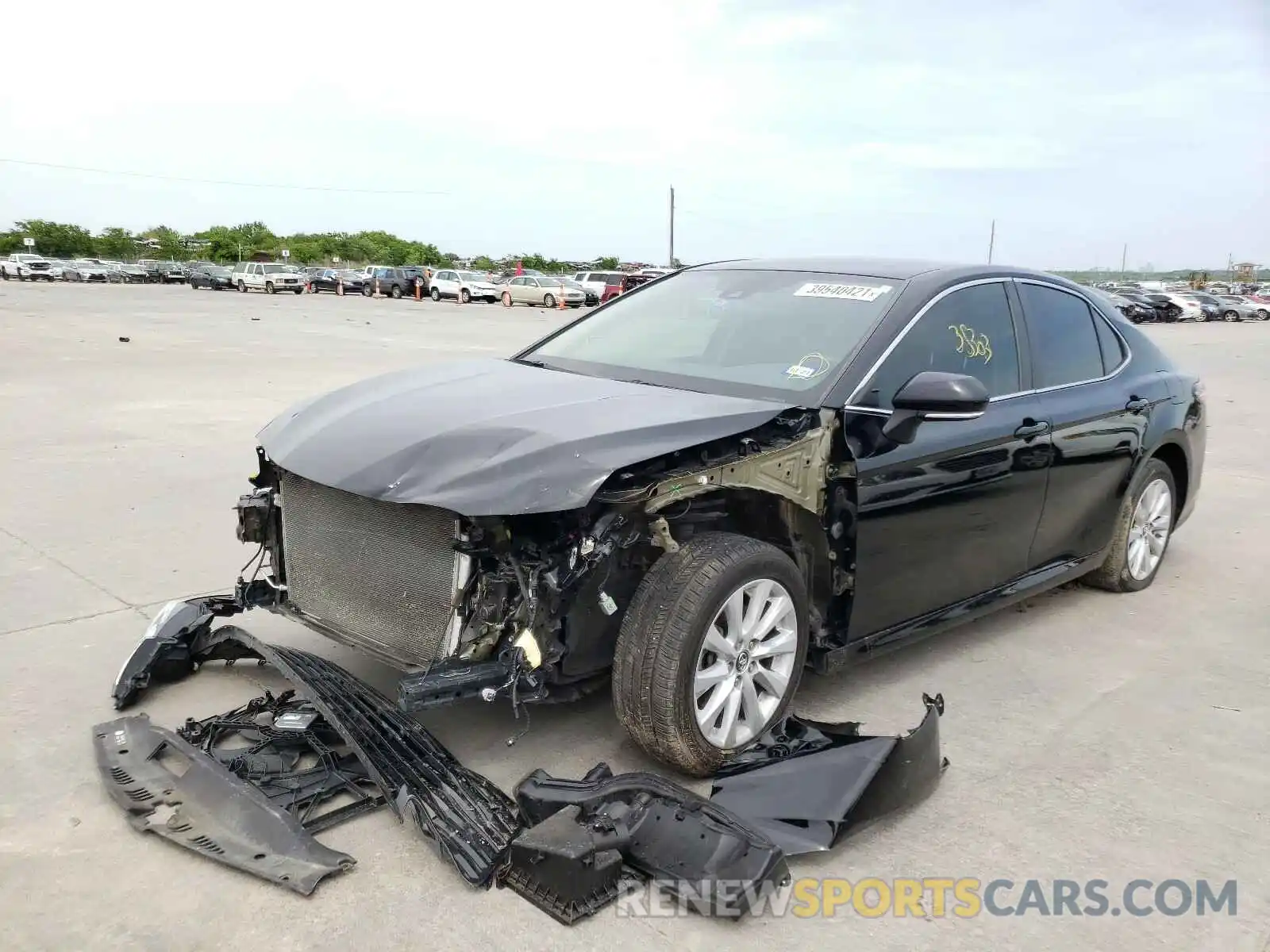 2 Photograph of a damaged car 4T1B11HK5KU854099 TOYOTA CAMRY 2019