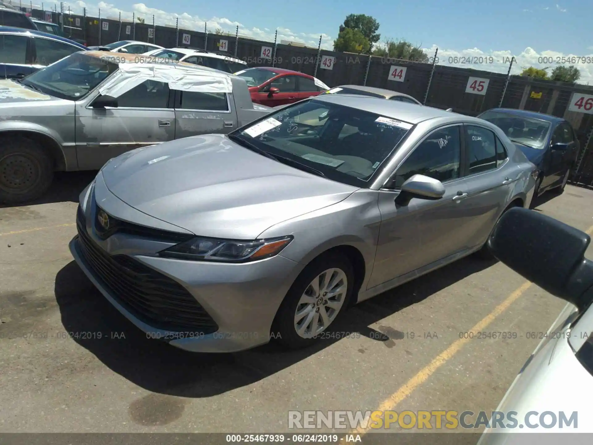 2 Photograph of a damaged car 4T1B11HK6KU161039 TOYOTA CAMRY 2019