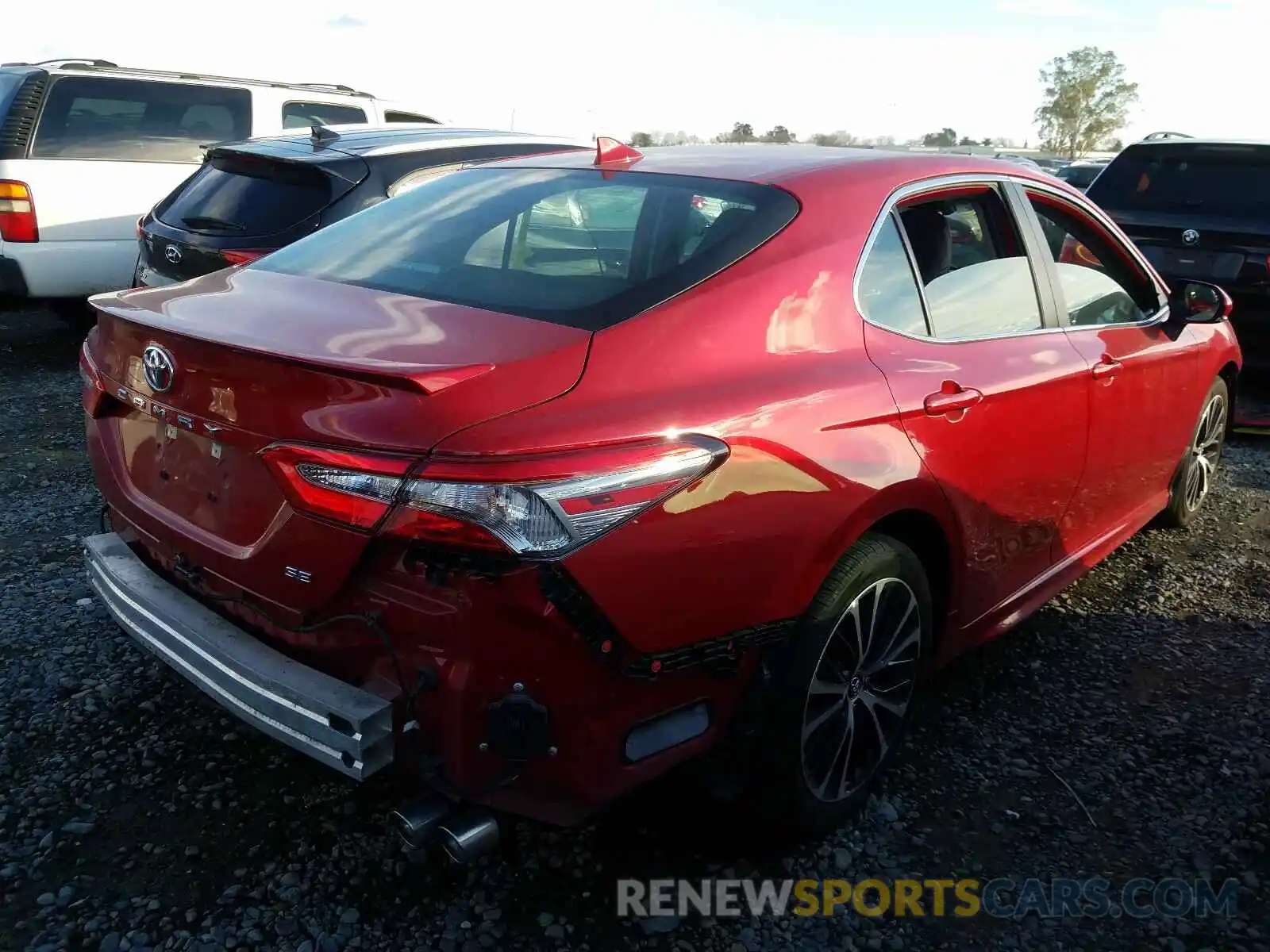 4 Photograph of a damaged car 4T1B11HK6KU163969 TOYOTA CAMRY 2019