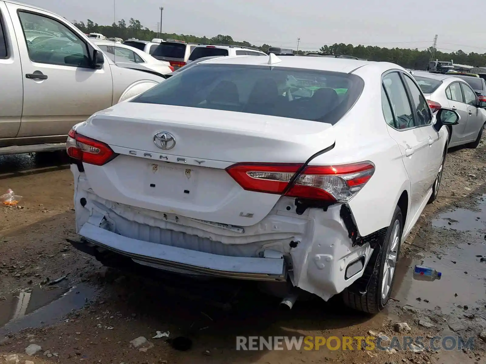 4 Photograph of a damaged car 4T1B11HK6KU165656 TOYOTA CAMRY 2019