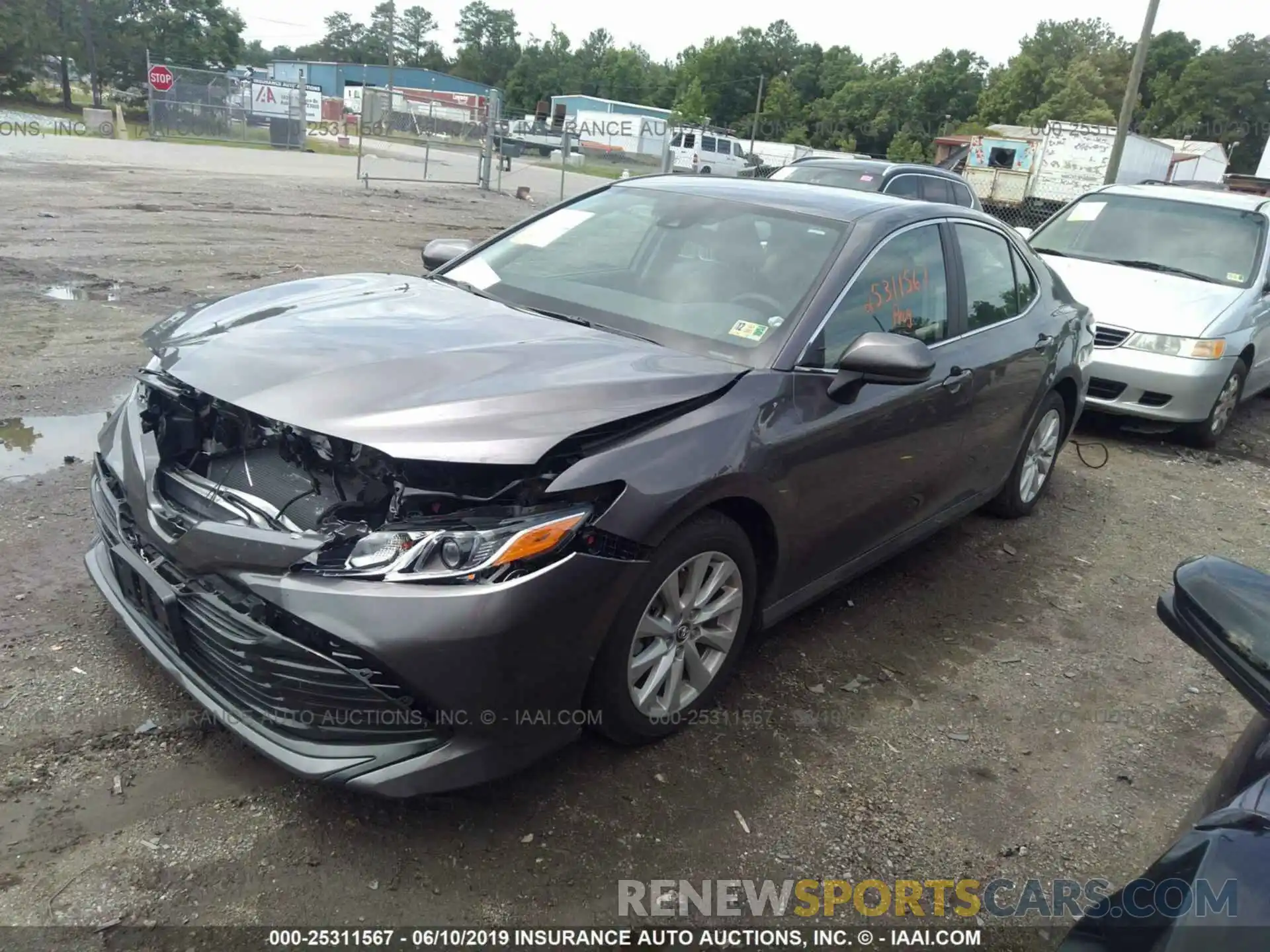 2 Photograph of a damaged car 4T1B11HK6KU174583 TOYOTA CAMRY 2019