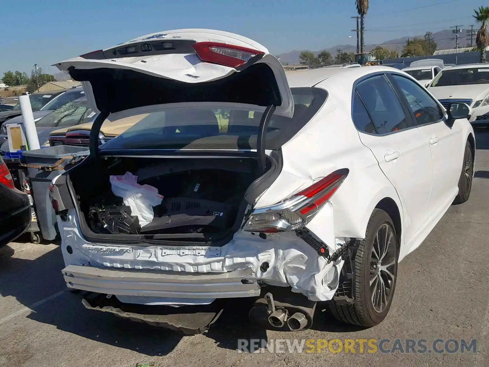 4 Photograph of a damaged car 4T1B11HK6KU187589 TOYOTA CAMRY 2019